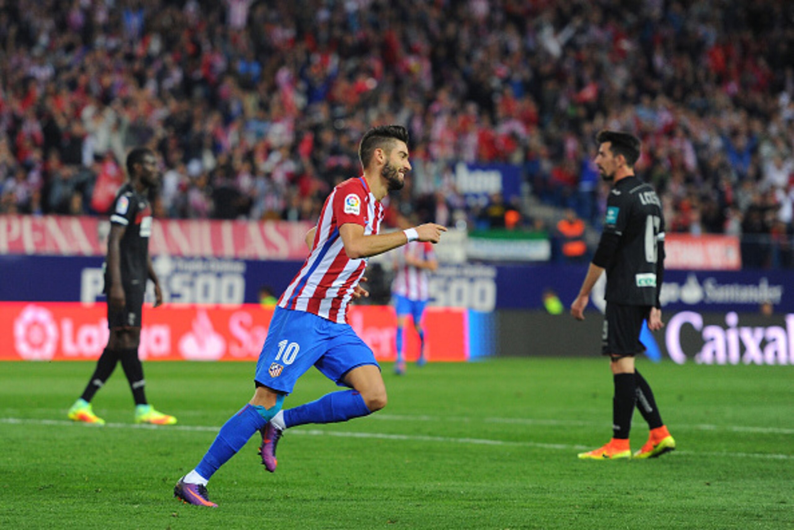 MADRID, SPAIN - OCTOBER 15:  Yannick Carrasco of Club Atletico de Madrid celebrates after scoring his 3rd goal during the La Liga match between Club Atletico de Madrid and Granada CF at Vicente Calderon Stadium on October 15, 2016 in Madrid, Spain.  (Phot