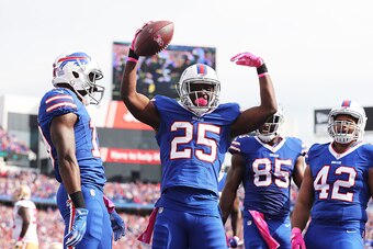 BUFFALO, NY - OCTOBER 16:   LeSean McCoy #25 of the Buffalo Bills celebrates a touchdown against the San Francisco 49ers during the first half at New Era Field on October 16, 2016 in Buffalo, New York.  (Photo by Brett Carlsen/Getty Images)