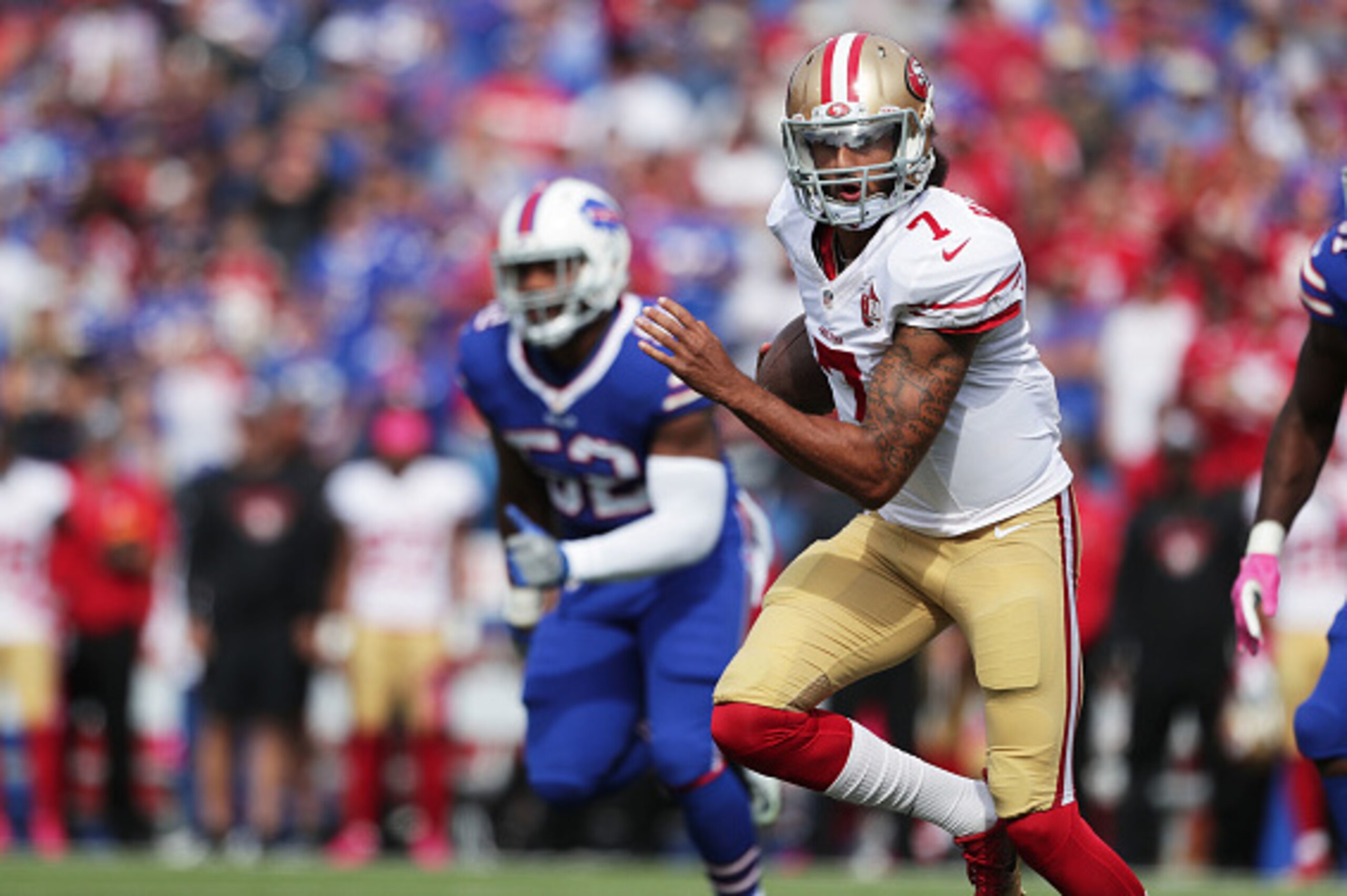 BUFFALO, NY - OCTOBER 16:   Colin Kaepernick #7 of the San Francisco 49ers runs the ball against the Buffalo Bills during the first half at New Era Field on October 16, 2016 in Buffalo, New York.  (Photo by Brett Carlsen/Getty Images)