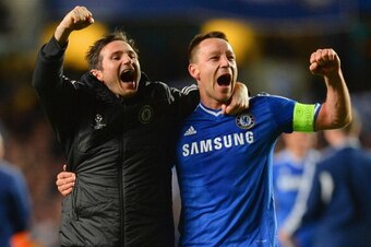 LONDON, ENGLAND - APRIL 08: Frank Lampard and John Terry of Chelsea celebrate victory during the UEFA Champions League Quarter Final second leg match between Chelsea and Paris Saint-Germain FC at Stamford Bridge on April 8, 2014 in London, England.  (Phot