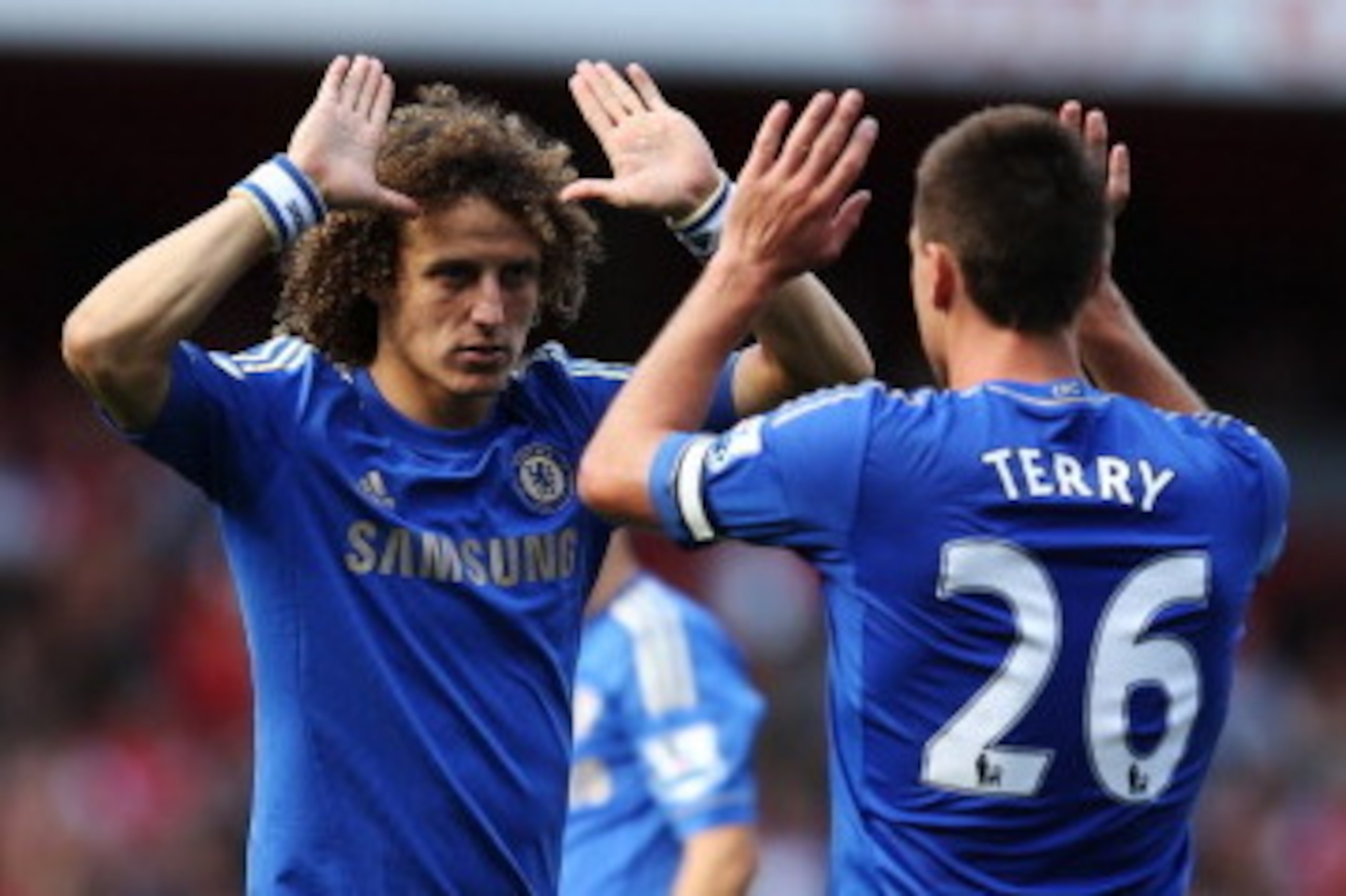 LONDON, ENGLAND - SEPTEMBER 29:  Chelsea's John Terry and David Luiz celebrate after Chelsea defeats Arsenal at the Barclays Premier League match between Arsenal and Chelsea at Emirates Stadium on September 29, 2012 in London, England.  (Photo by Richard 
