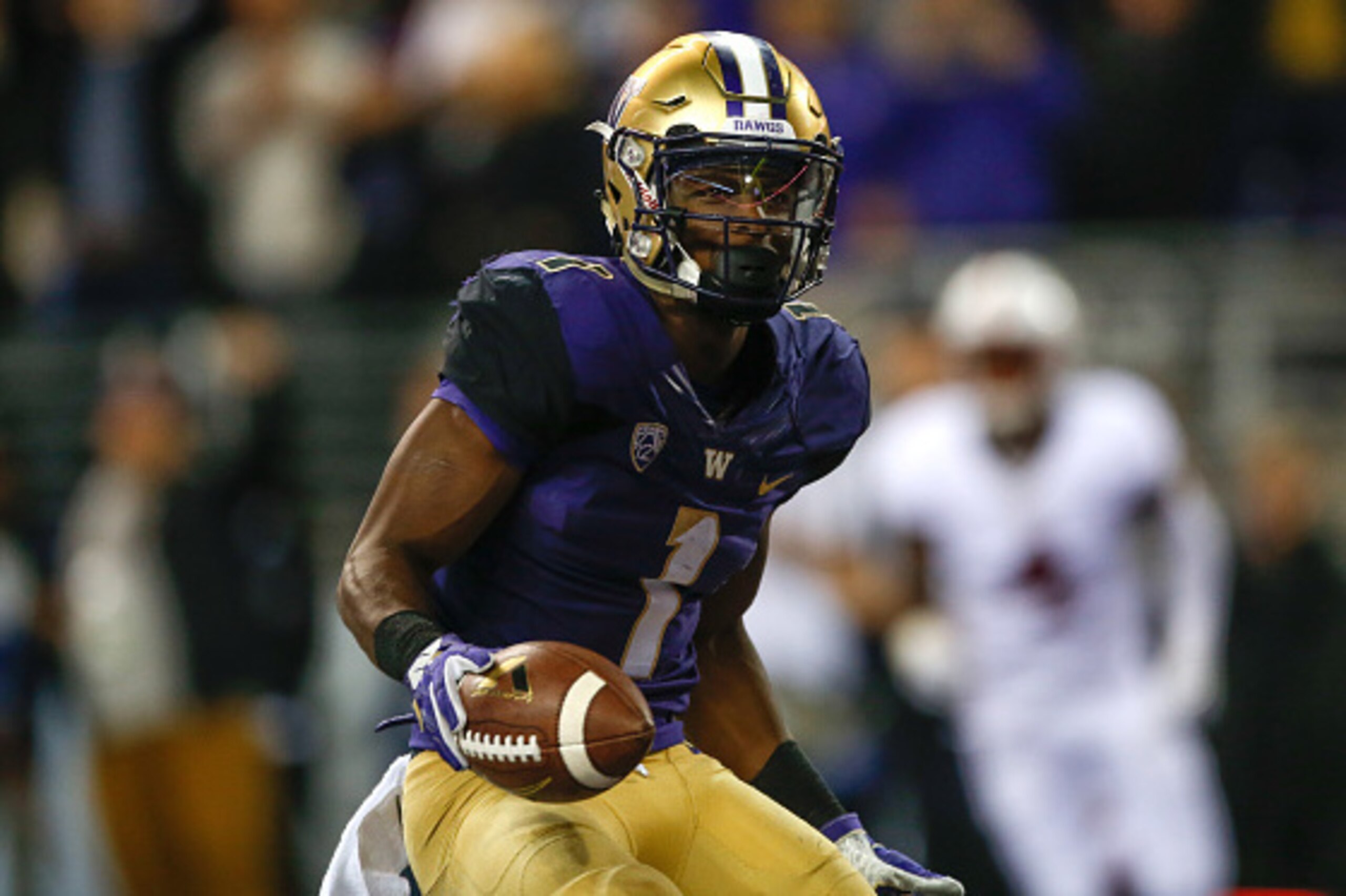 SEATTLE, WA - SEPTEMBER 30:  Wide receiver John Ross #1 of the Washington Huskies scores a touchdown against the Stanford Cardinal in the second quarter on September 30, 2016 at Husky Stadium in Seattle, Washington.  (Photo by Otto Greule Jr/Getty Images)