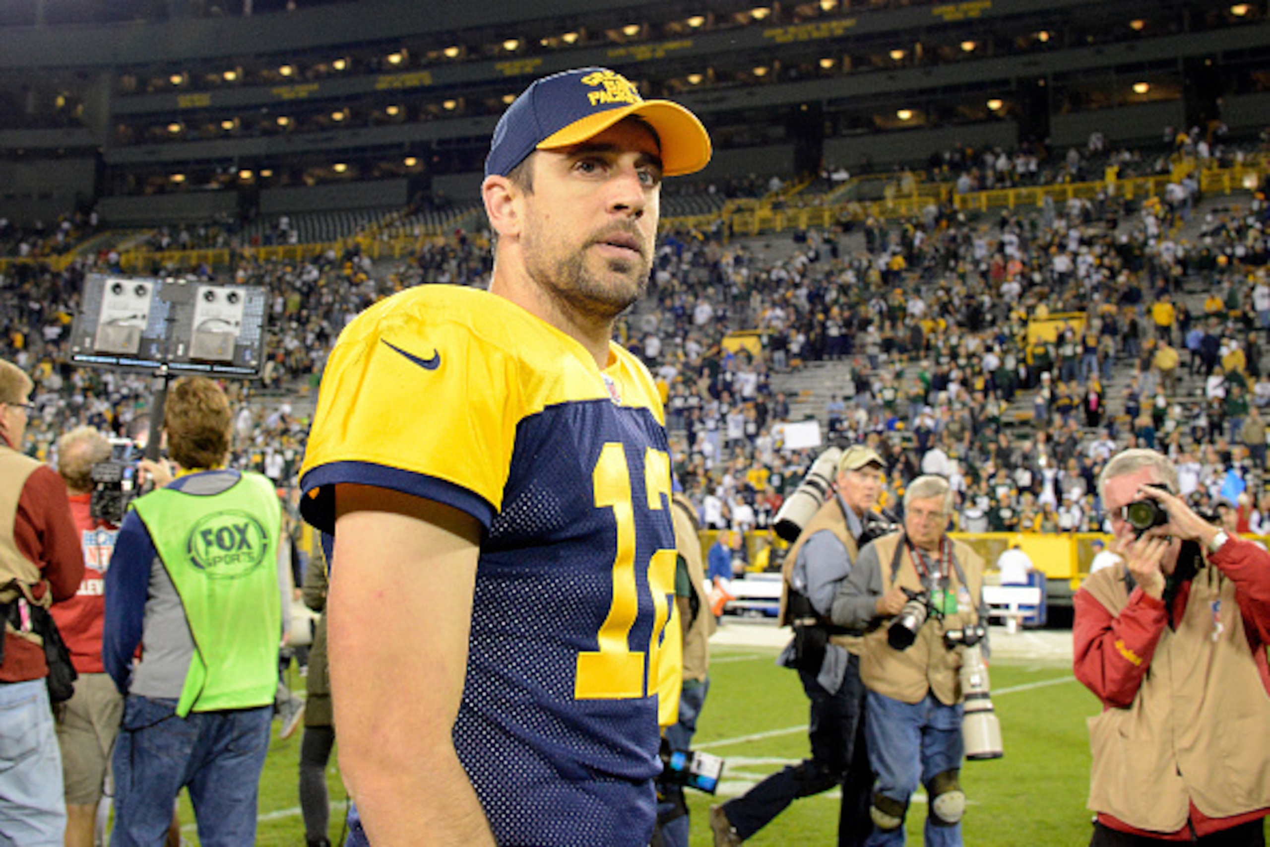 GREEN BAY, WI - OCTOBER 16: Aaron Rodgers #12 of the Green Bay Packers walks off the field after losing to the Dallas Cowboys at Lambeau Field on October 16, 2016 in Green Bay, Wisconsin. The Dallas Cowboys defeated the Green Bay Packers 30-16.  (Photo by