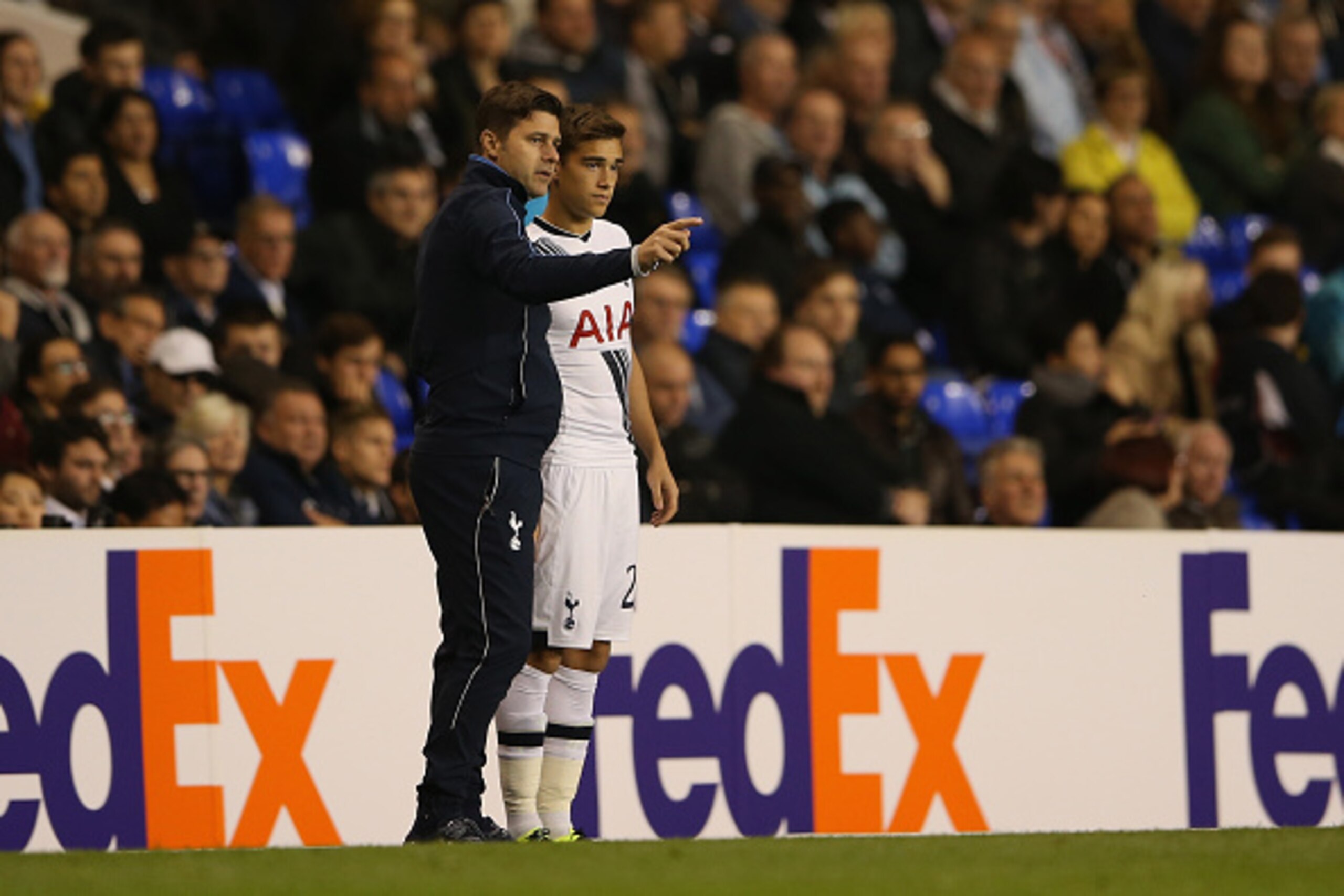 LONDON, ENGLAND - SEPTEMBER 17: Mauricio Pochettino manager of Tottenham Hotspur speaks to Harry Winks of Tottenham Hotspur during the UEFA Europa League Group J match between Tottenham Hotspur FC and Qarabag FK at White Hart Lane on September 17, 2015 i LONDON, ENGLAND - SEPTEMBER 17: Mauricio Pochettino manager of Tottenham Hotspur speaks to Harry Winks of Tottenham Hotspur during the UEFA Europa League Group J match between Tottenham Hotspur FC and Qarabag FK at White Hart Lane on September 17, 2015 i