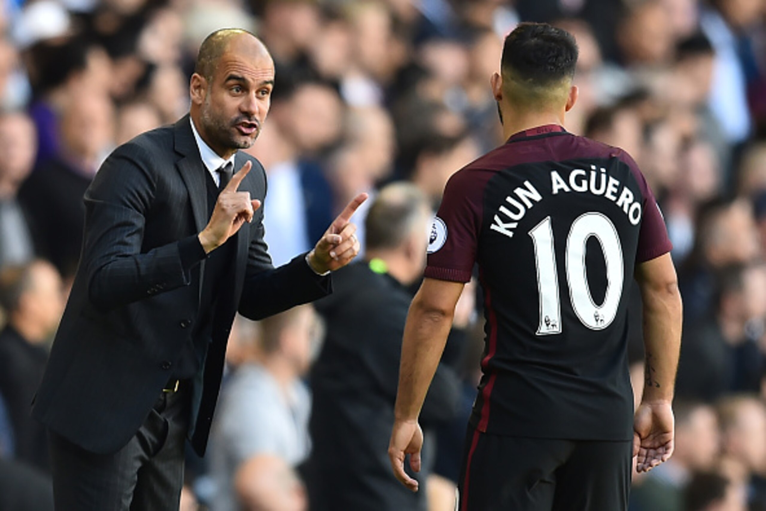 Manchester City's Spanish manager Pep Guardiola (L) gestures to Manchester City's Argentinian striker Sergio Aguero during the English Premier League football match between Tottenham Hotspur and Manchester City at White Hart Lane in London, on October 2, Manchester City's Spanish manager Pep Guardiola (L) gestures to Manchester City's Argentinian striker Sergio Aguero during the English Premier League football match between Tottenham Hotspur and Manchester City at White Hart Lane in London, on October 2,
