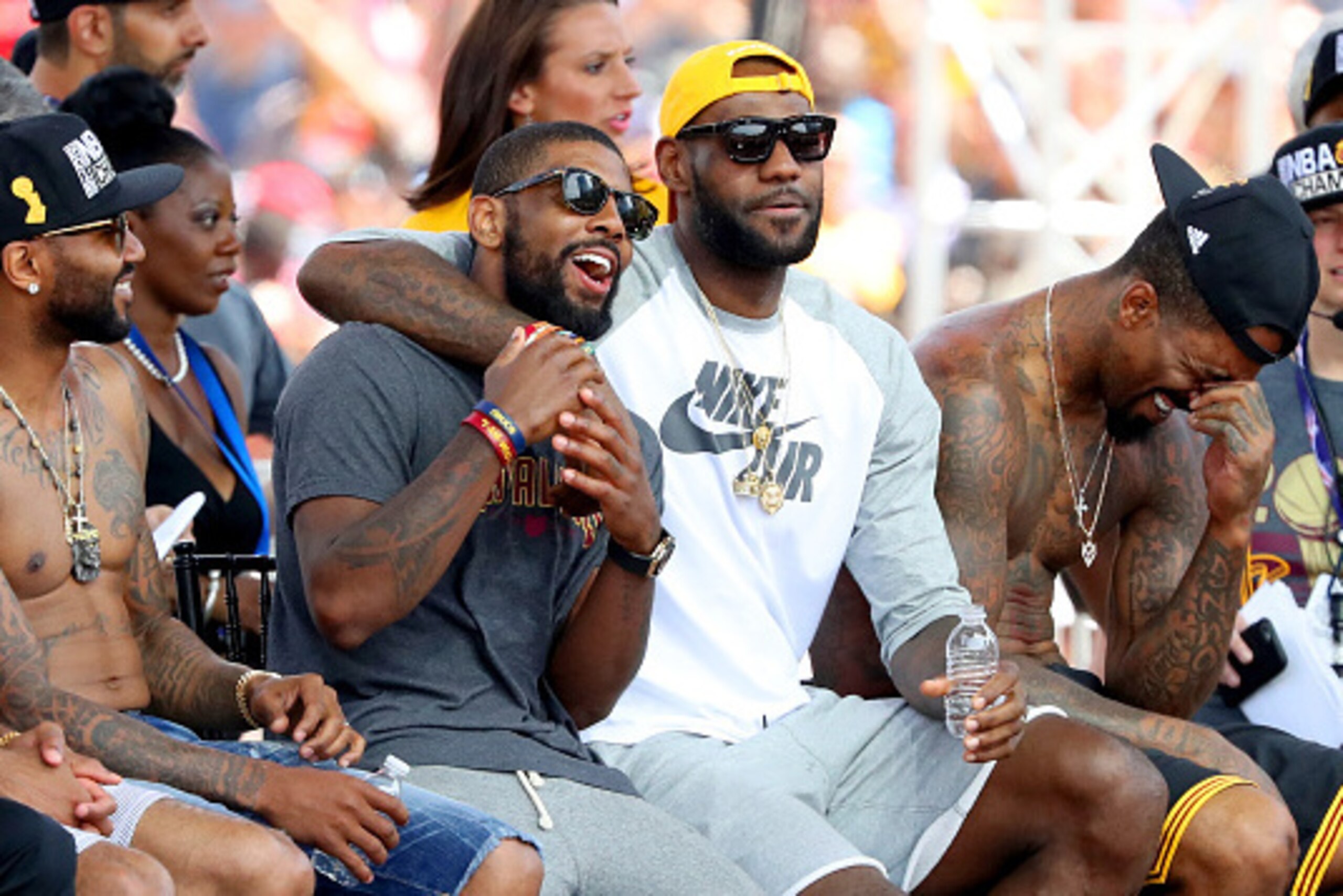 CLEVELAND, OH - JUNE 22:  Kyrie Irving #2, LeBron James #23 and J.R. Smith #5 of the Cleveland Cavaliers look on during the Cleveland Cavaliers 2016 NBA Championship victory parade and rally on June 22, 2016 in Cleveland, Ohio.  (Photo by Mike Lawrie/Gett