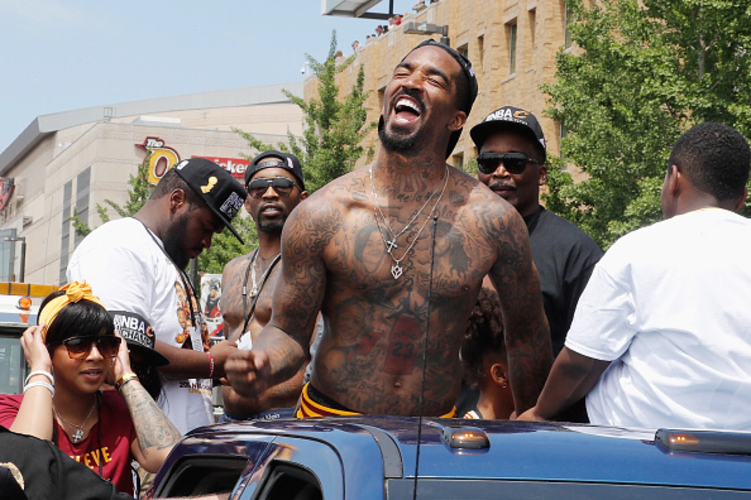 CLEVELAND, OH - JUNE 22:  J.R. Smith #5 of the Cleveland Cavaliers waves at fans during the Cleveland Cavaliers Victory Parade And Rally on June 22, 2016 in downtown Cleveland, Ohio.  NOTE TO USER: User expressly acknowledges and agrees that, by downloadi