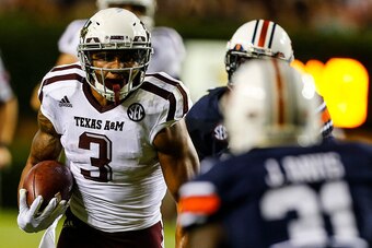 AUBURN, AL - SEPTEMBER 17:  Wide receiver Christian Kirk #3 of the Texas A&M Aggies carries the ball against the Auburn Tigers during an NCAA college football game on September 17, 2016 in Auburn, Alabama. (Photo by Butch Dill/Getty Images)