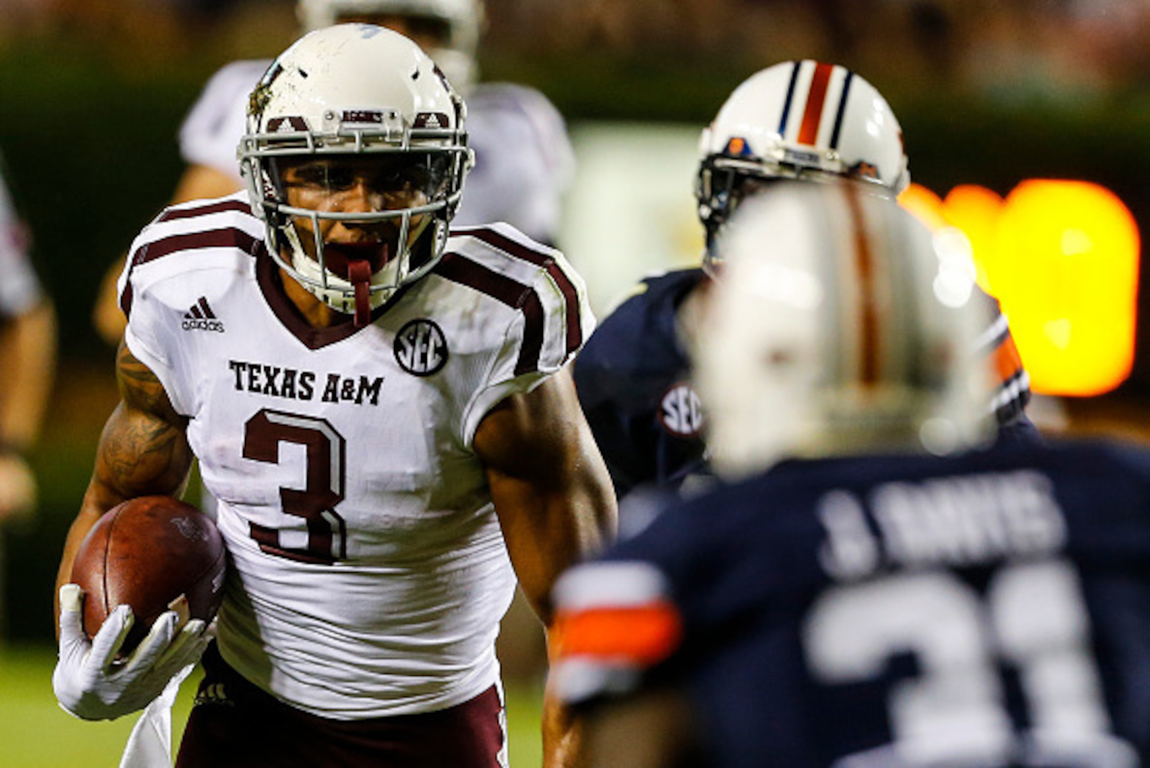 AUBURN, AL - SEPTEMBER 17: Wide receiver Christian Kirk #3 of the Texas A&M Aggies carries the ball against the Auburn Tigers during an NCAA college football game on September 17, 2016 in Auburn, Alabama. (Photo by Butch Dill/Getty Images) AUBURN, AL - SEPTEMBER 17: Wide receiver Christian Kirk #3 of the Texas A&M Aggies carries the ball against the Auburn Tigers during an NCAA college football game on September 17, 2016 in Auburn, Alabama. (Photo by Butch Dill/Getty Images)