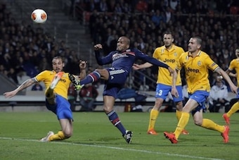 Jimmy Briand battles Juve's back line in OL's 2014 Europa League quarter-final loss.