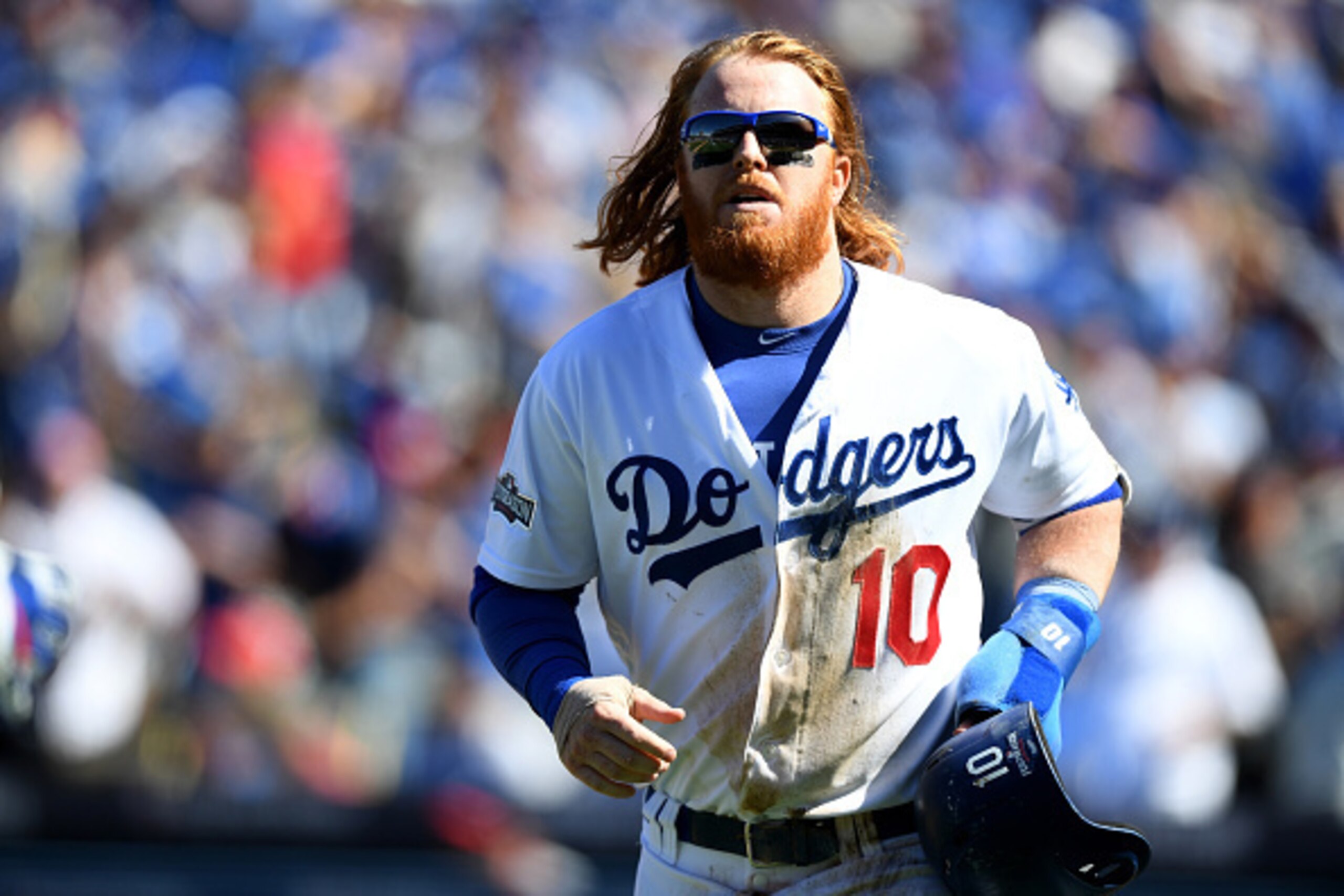 LOS ANGELES, CA - OCTOBER 10:  Justin Turner #10 of the Los Angeles Dodgers celebrates after scoring a run in the first inning against the Washington Nationals in game three of the National League Division Series at Dodger Stadium on October 10, 2016 in L