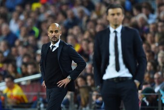 BARCELONA, SPAIN - MAY 06:  A dejected Josep Guardiola the head coach of Bayern Muenchen looks on past Luis Enrique the head coach of Barcelona during the UEFA Champions League Semi Final, first leg match between FC Barcelona and FC Bayern Muenchen at Cam