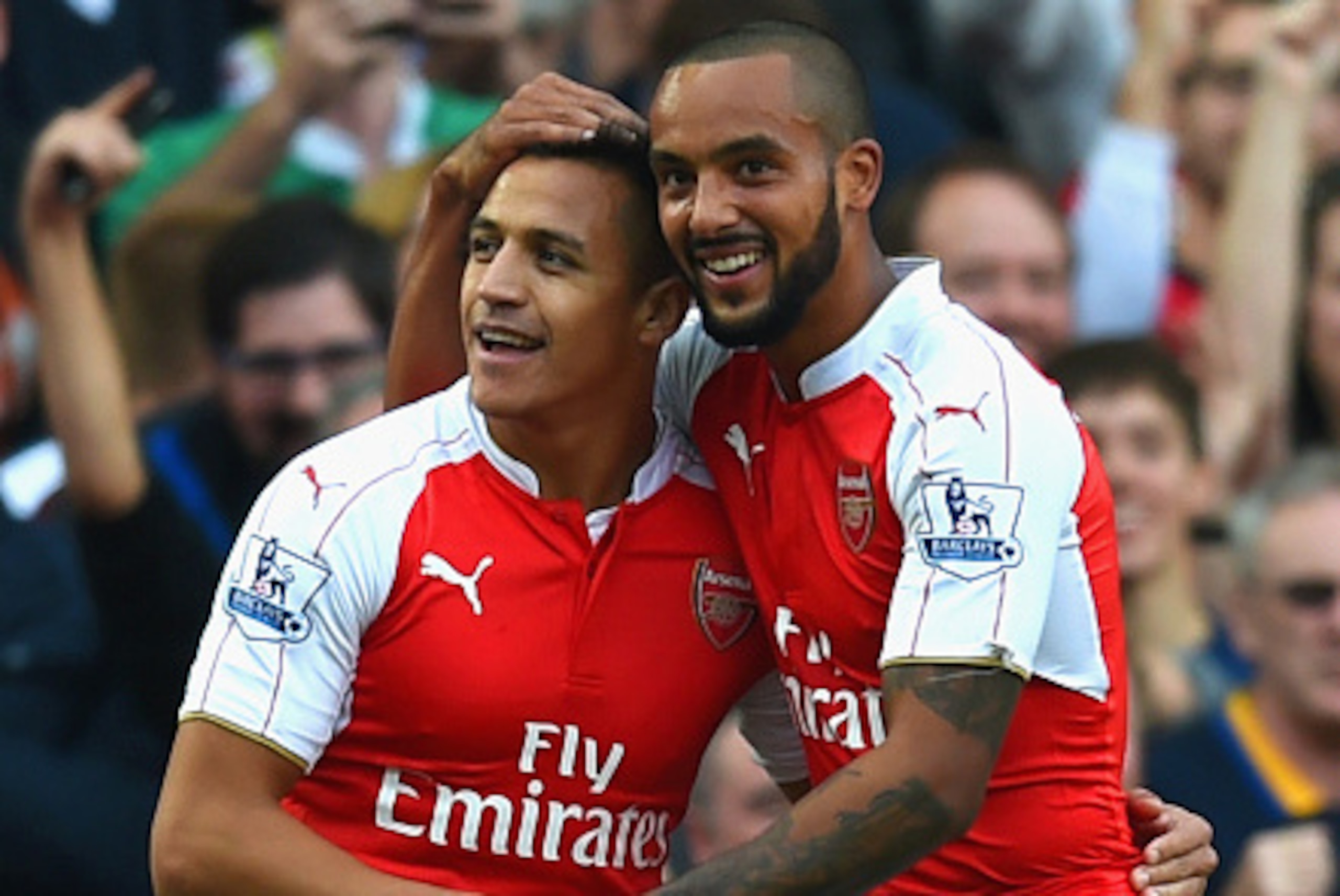 LONDON, ENGLAND - OCTOBER 04: Alexis Sanchez of Arsenal celebrates scoring their third goal with Theo Walcott of Arsenal during the Barclays Premier League match between Arsenal and Manchester United at Emirates Stadium on October 4, 2015 in London, Engl LONDON, ENGLAND - OCTOBER 04: Alexis Sanchez of Arsenal celebrates scoring their third goal with Theo Walcott of Arsenal during the Barclays Premier League match between Arsenal and Manchester United at Emirates Stadium on October 4, 2015 in London, Engl