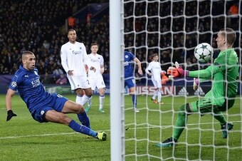 Leicester City's Algerian striker Islam Slimani (L) shoots to score, but the goal is dissallowed as he was ruled to be offside, during the UEFA Champions League group G football match between Leicester City and FC Copenhagen at the King Power Stadium in L