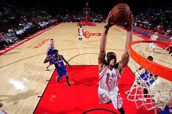 HOUSTON, TX - OCTOBER 4:  K.J. McDaniels #32 of the Houston Rockets goes up for a dunk against the New York Knicks during a preseason game on October 4, 2016 at the Toyota Center in Houston, Texas. NOTE TO USER: User expressly acknowledges and agrees that