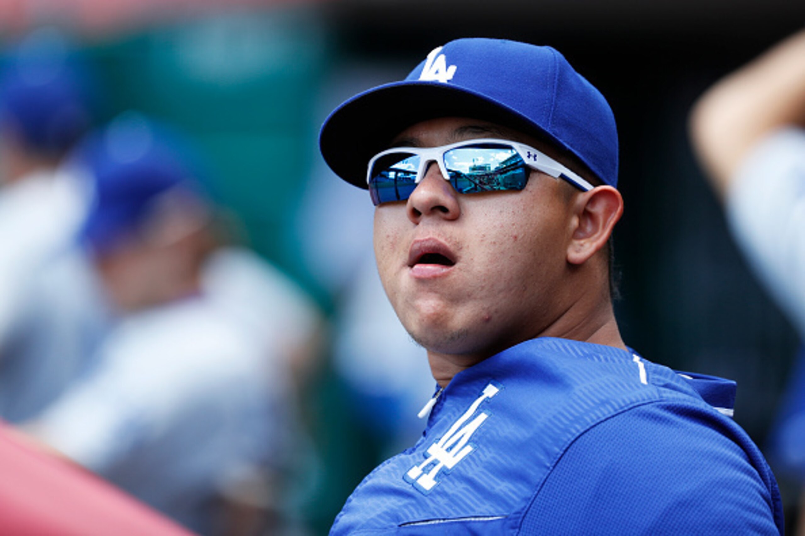 CINCINNATI, OH - AUGUST 22: Julio Urias #7 of the Los Angeles Dodgers looks on against the Cincinnati Reds during the game at Great American Ball Park on August 22, 2016 in Cincinnati, Ohio. The Dodgers defeated the Reds 18-9. (Photo by Joe Robbins/Getty 