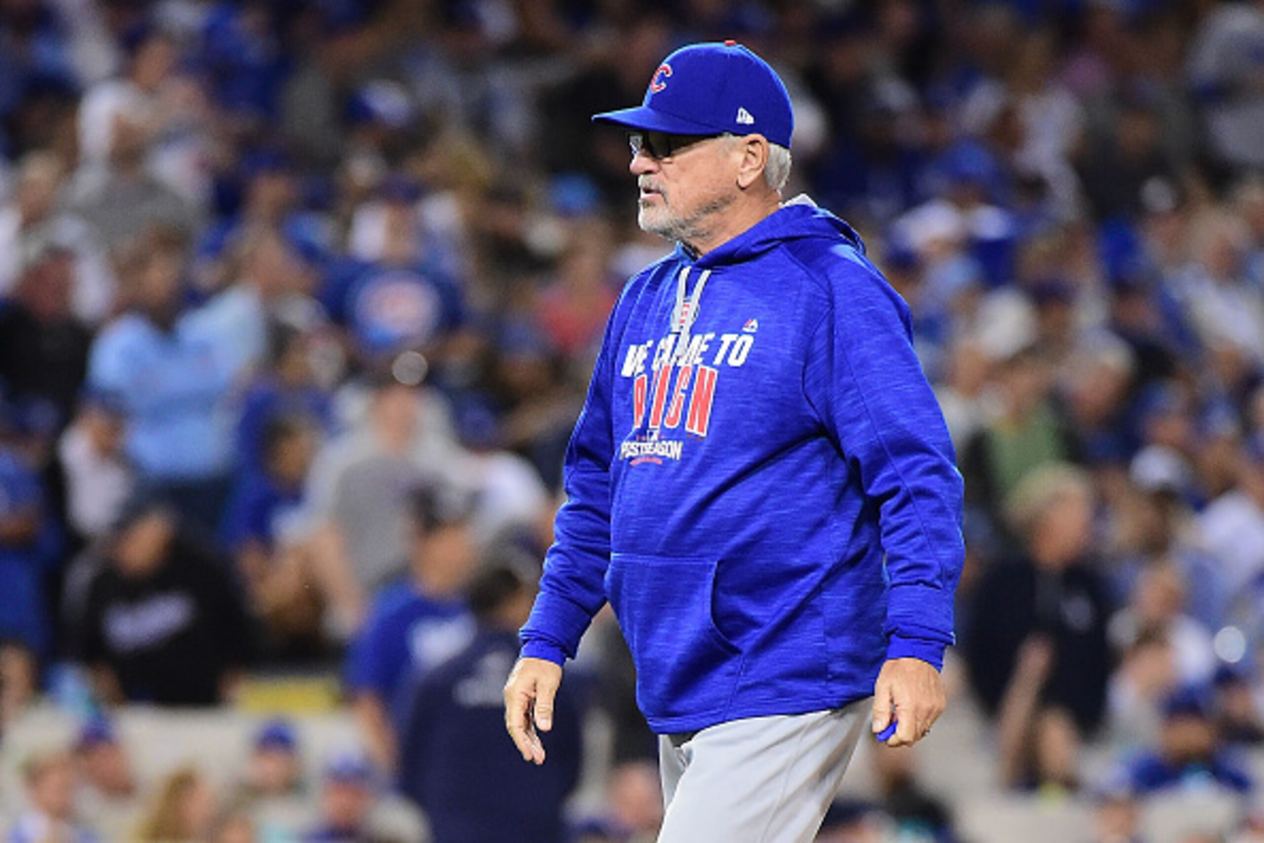 LOS ANGELES, CA - OCTOBER 18:  Joe Maddon #70 of the Chicago Cubs walks off the mound after a pitching change in the sixth inning against the Los Angeles Dodgers in game three of the National League Championship Series at Dodger Stadium on October 18, 201