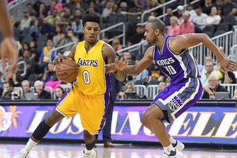 LAS VEGAS, NV - OCTOBER 13:  Nick Young #0 of the Los Angeles Lakers drives against Arron Afflalo #40 of the Sacramento Kings during their preseason game at T-Mobile Arena on October 13, 2016 in Las Vegas, Nevada. Sacramento won 116-104. NOTE TO USER: Use