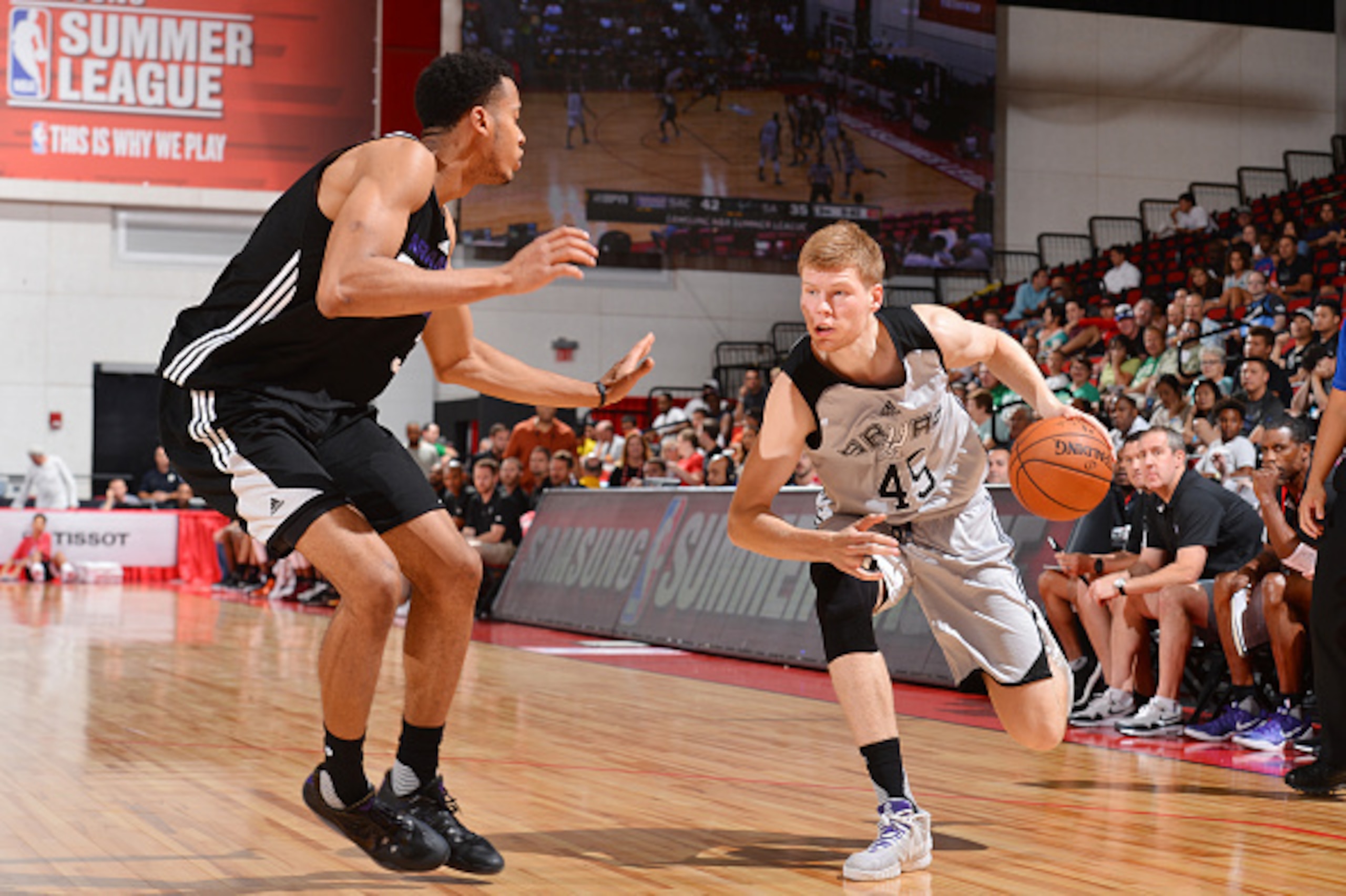 LAS VEGAS, NV - JULY 15: Davis Bertans #45 of the San Antonio Spurs handles the ball against the Sacramento Kings during the 2016 NBA Las Vegas Summer League game on July 15, 2016 at the Cox Pavilion in Las Vegas, Nevada. NOTE TO USER: User expressly ack LAS VEGAS, NV - JULY 15: Davis Bertans #45 of the San Antonio Spurs handles the ball against the Sacramento Kings during the 2016 NBA Las Vegas Summer League game on July 15, 2016 at the Cox Pavilion in Las Vegas, Nevada. NOTE TO USER: User expressly ack