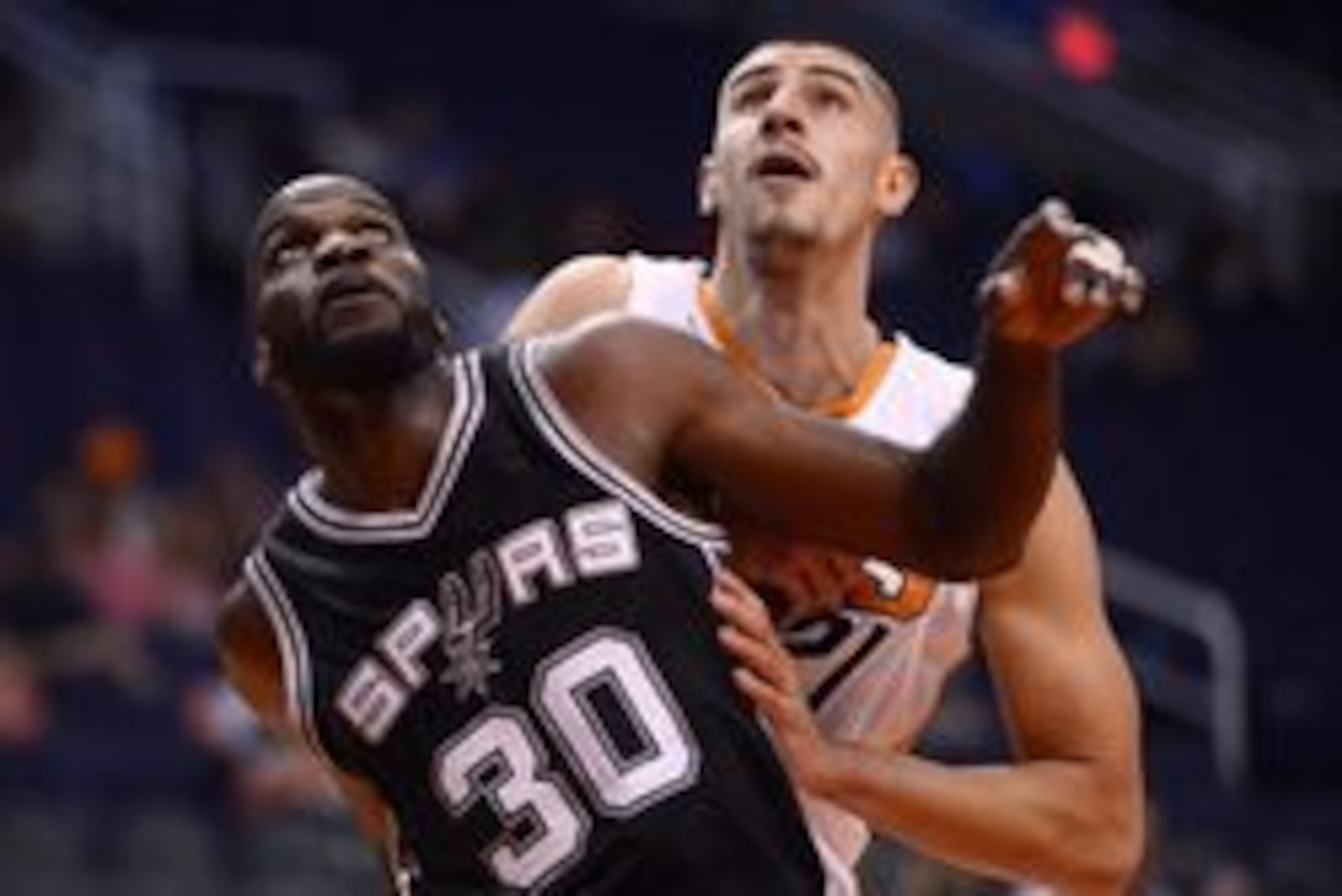Oct 3, 2016; Phoenix, AZ, USA; San Antonio Spurs center Joel Anthony (30) boxes out Phoenix Suns center Alex Len (21) during the first half at Talking Stick Resort Arena. Mandatory Credit: Joe Camporeale-USA TODAY Sports