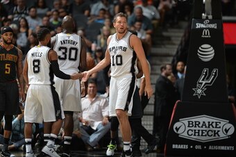 SAN ANTONIO, TX - OCTOBER 8 : Patty Mills #8 and David Lee #10 of the San Antonio Spurs celebrate against the Atlanta Hawks on October 8, 2016 at the AT&T Center in San Antonio, Texas. NOTE TO USER: User expressly acknowledges and agrees that, by download