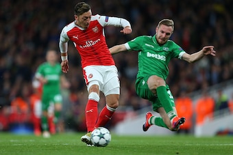 LONDON, ENGLAND - OCTOBER 19: Mesut Ozil of Arsenal scores a goal to make it 4-0 during the UEFA Champions League match between Arsenal FC and PFC Ludogorets Razgrad at Emirates Stadium on October 19, 2016 in London, England. (Photo by Catherine Ivill - A