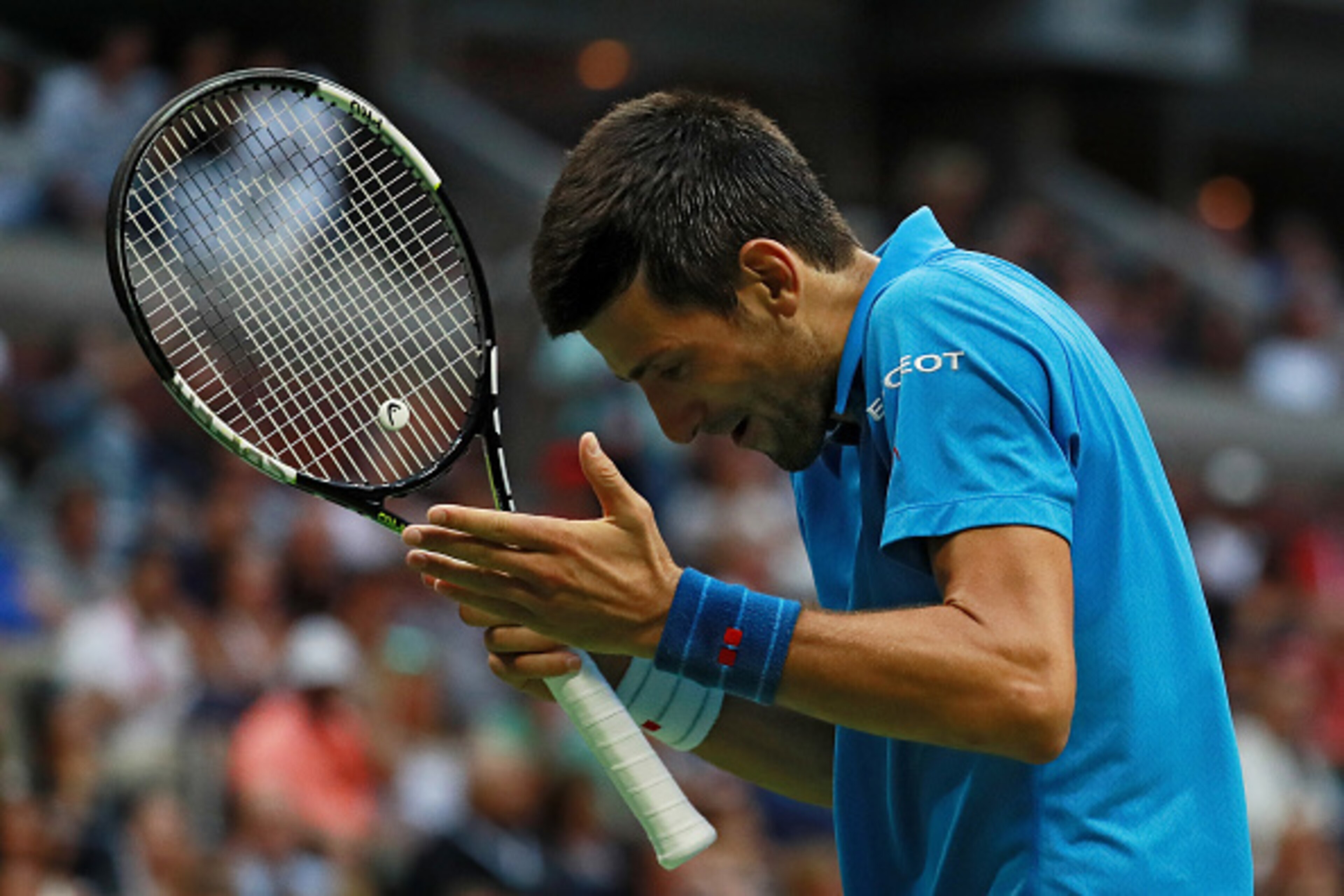 NEW YORK, NY - SEPTEMBER 11: Novak Djokovic of Serbia reacts against Stan Wawrinka of Switzerland during their Men's Singles Final Match on Day Fourteen of the 2016 US Open at the USTA Billie Jean King National Tennis Center on September 11, 2016 in the NEW YORK, NY - SEPTEMBER 11: Novak Djokovic of Serbia reacts against Stan Wawrinka of Switzerland during their Men's Singles Final Match on Day Fourteen of the 2016 US Open at the USTA Billie Jean King National Tennis Center on September 11, 2016 in the