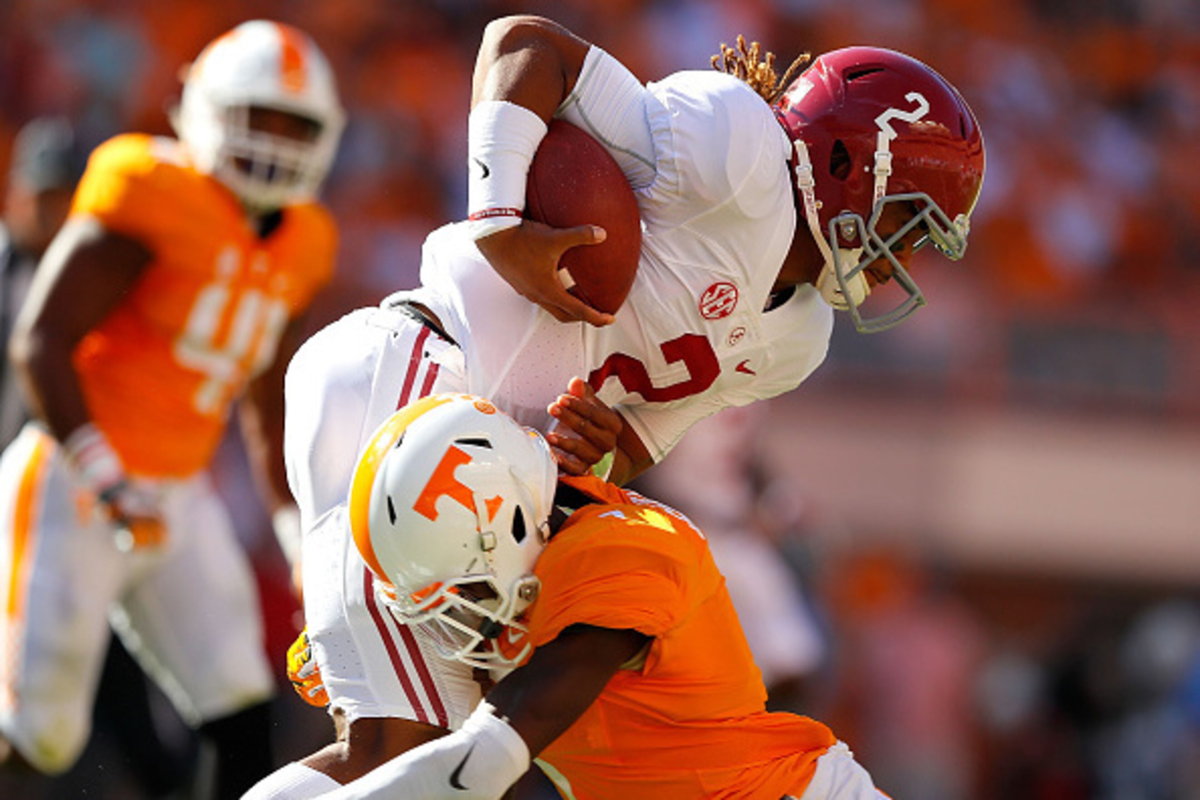 KNOXVILLE, TN - OCTOBER 15:  Rashaan Gaulden #7 of the Tennessee Volunteers tackles Jalen Hurts #2 of the Alabama Crimson Tide at Neyland Stadium on October 15, 2016 in Knoxville, Tennessee.  (Photo by Kevin C. Cox/Getty Images)