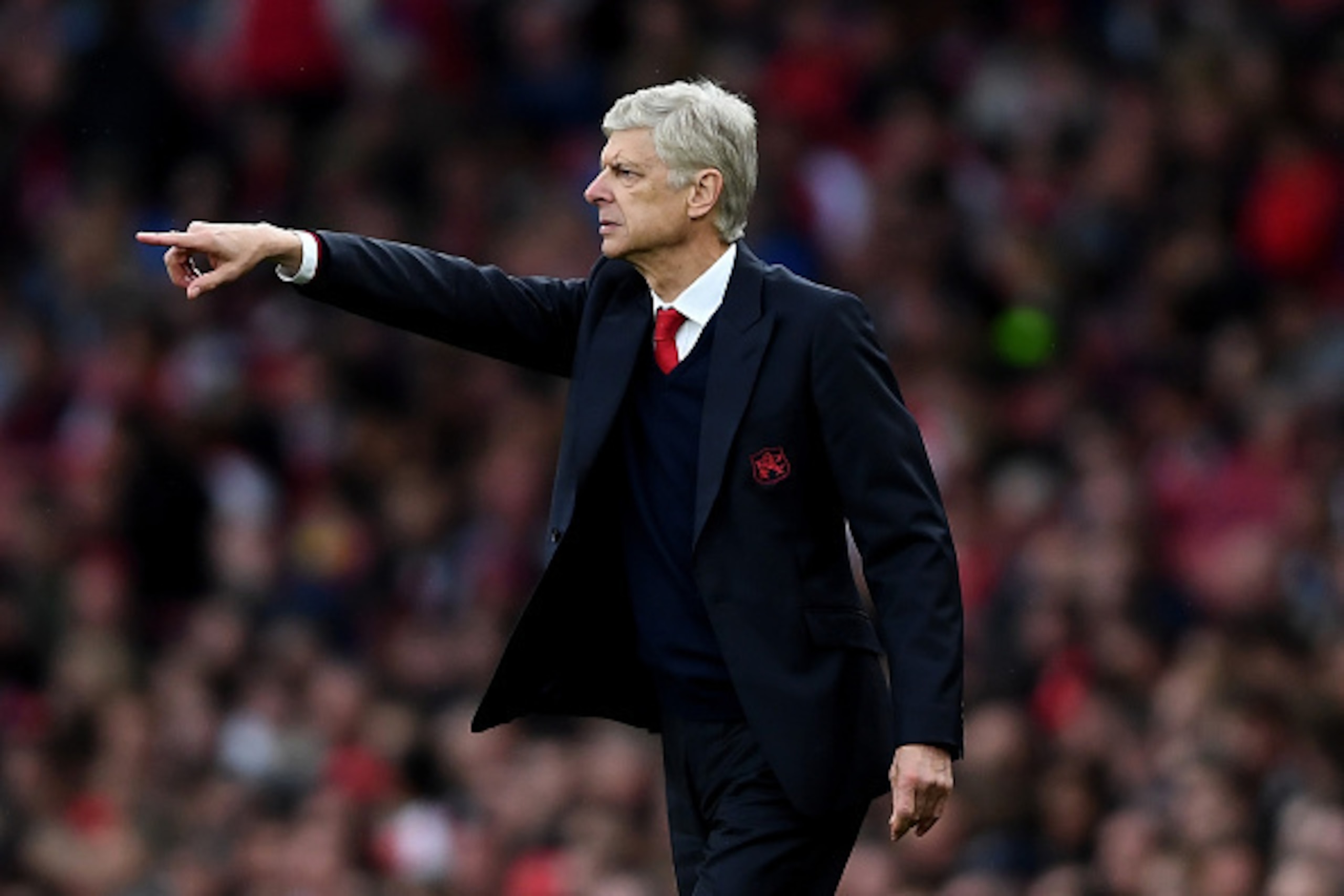 LONDON, ENGLAND - OCTOBER 15: Arsene Wenger, Manager of Arsenal gives his team instructions during the Premier League match between Arsenal and Swansea City at Emirates Stadium on October 15, 2016 in London, England. (Photo by Mike Hewitt/Getty Images) LONDON, ENGLAND - OCTOBER 15: Arsene Wenger, Manager of Arsenal gives his team instructions during the Premier League match between Arsenal and Swansea City at Emirates Stadium on October 15, 2016 in London, England. (Photo by Mike Hewitt/Getty Images)