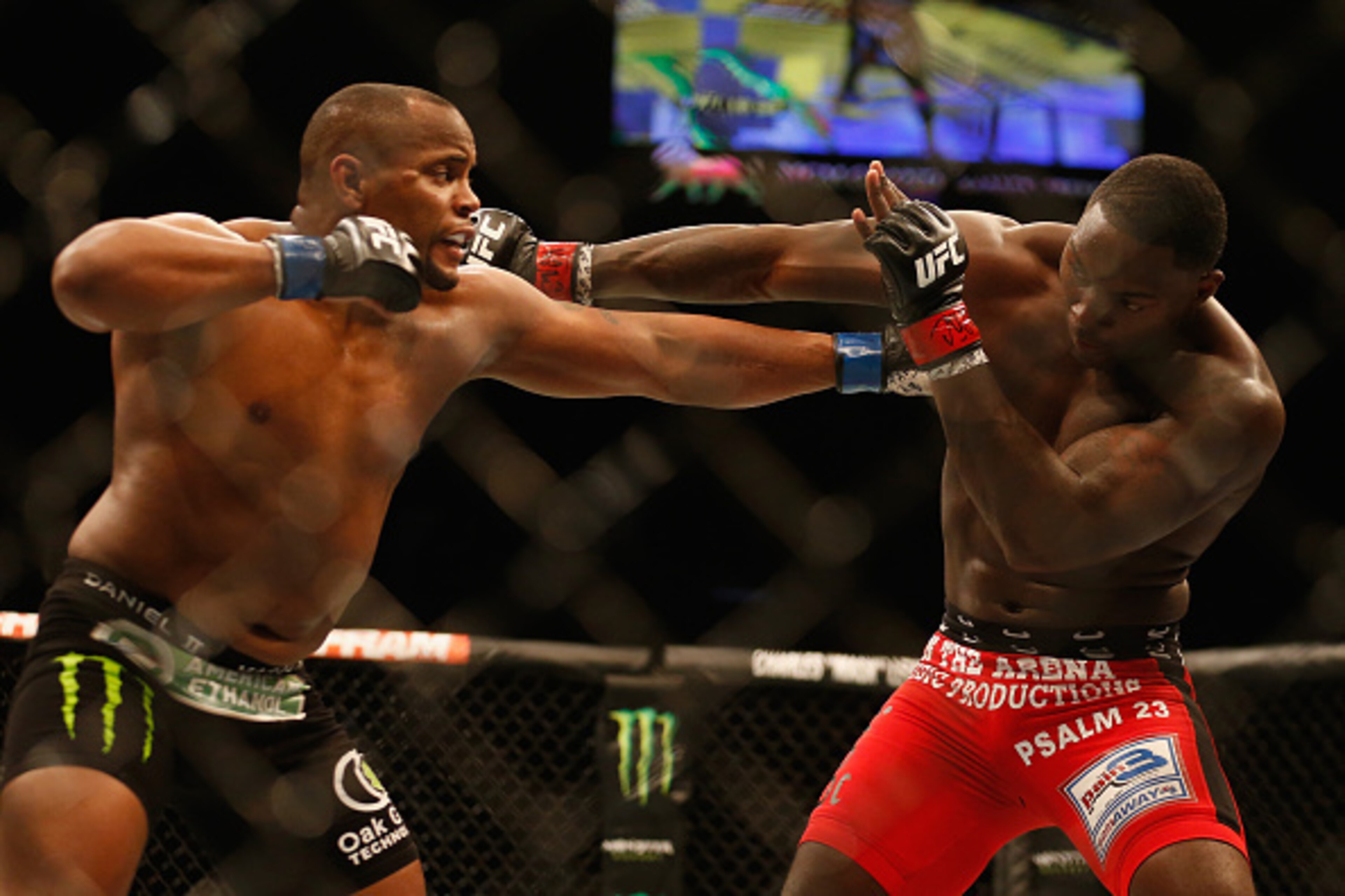 LAS VEGAS, NV - MAY 23: (L-R) Daniel Cormier punches Anthony Johnson in their UFC light heavyweight championship bout during the UFC 187 event at the MGM Grand Garden Arena on May 23, 2015 in Las Vegas, Nevada. (Photo by Christian Petersen/Zuffa LLC/Zuf LAS VEGAS, NV - MAY 23: (L-R) Daniel Cormier punches Anthony Johnson in their UFC light heavyweight championship bout during the UFC 187 event at the MGM Grand Garden Arena on May 23, 2015 in Las Vegas, Nevada. (Photo by Christian Petersen/Zuffa LLC/Zuf