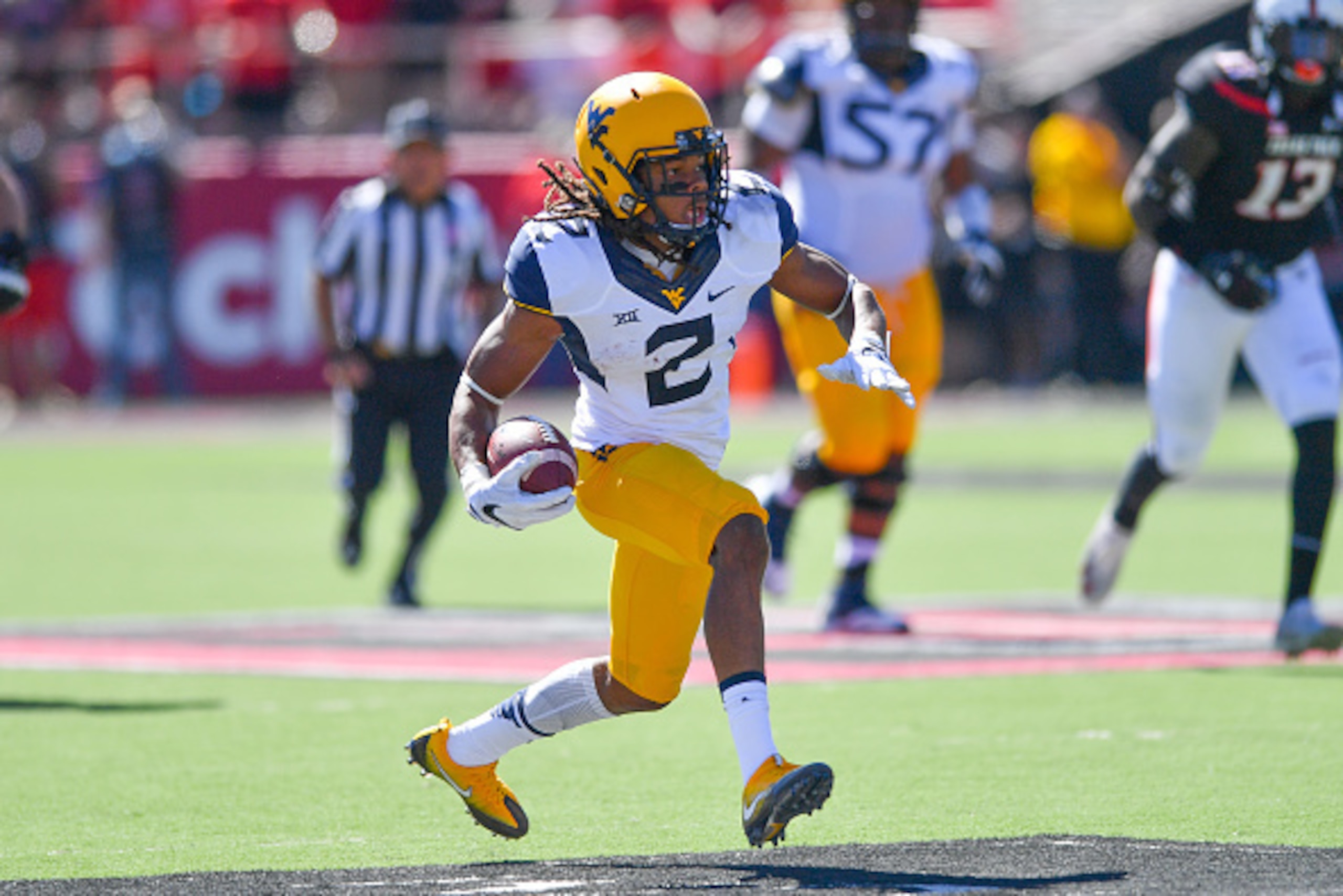LUBBOCK, TX - OCTOBER 15: Ka'Raun White #2 of the West Virginia Mountaineers carries the ball during the game against the Texas Tech Red Raiders on October 15, 2016 at AT&T Jones Stadium in Lubbock, Texas. (Photo by John Weast/Getty Images)  *** Local Cap