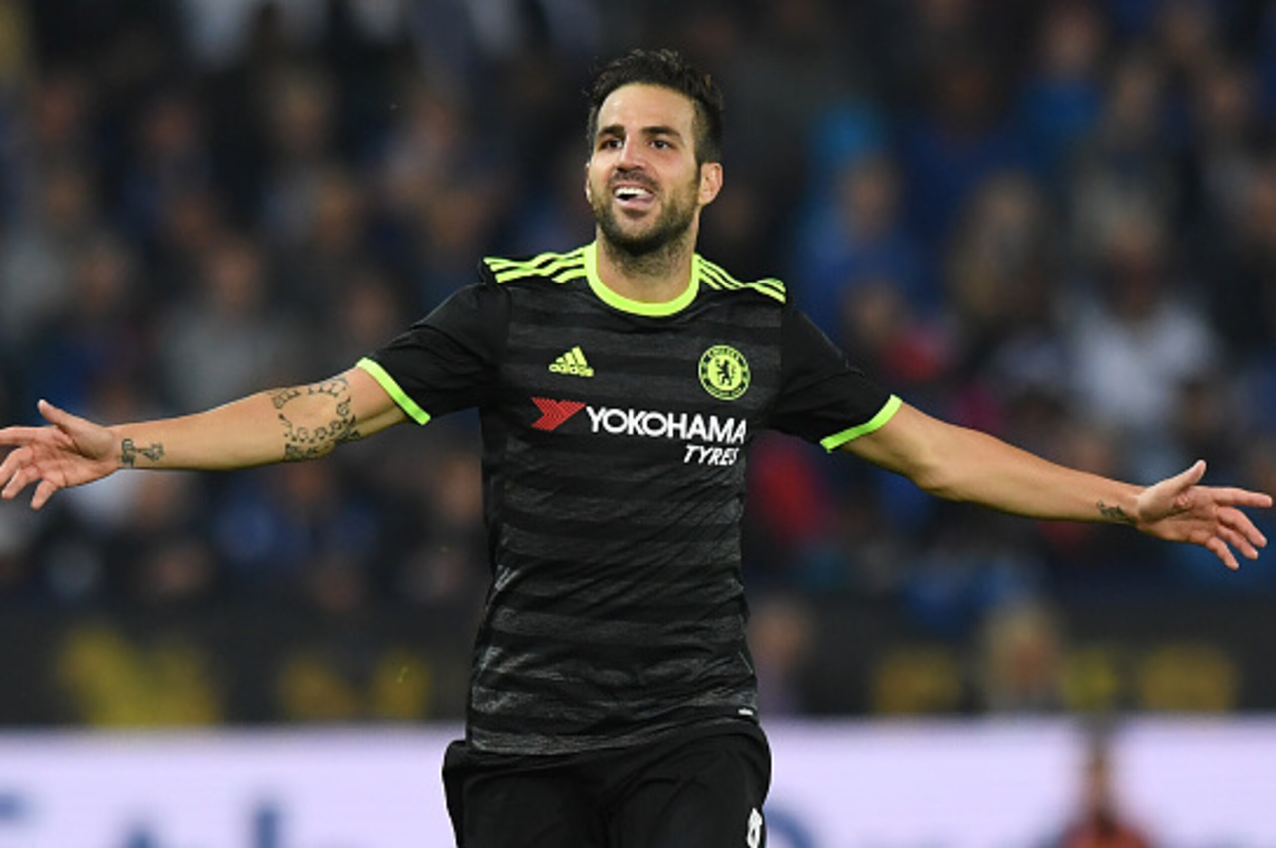 Chelsea's Spanish midfielder Cesc Fabregas celebrates scoring their fourth goal during extra-time in the English League Cup third round football match between Leicester City and Chelsea at King Power Stadium in Leicester, central England on September 20, 