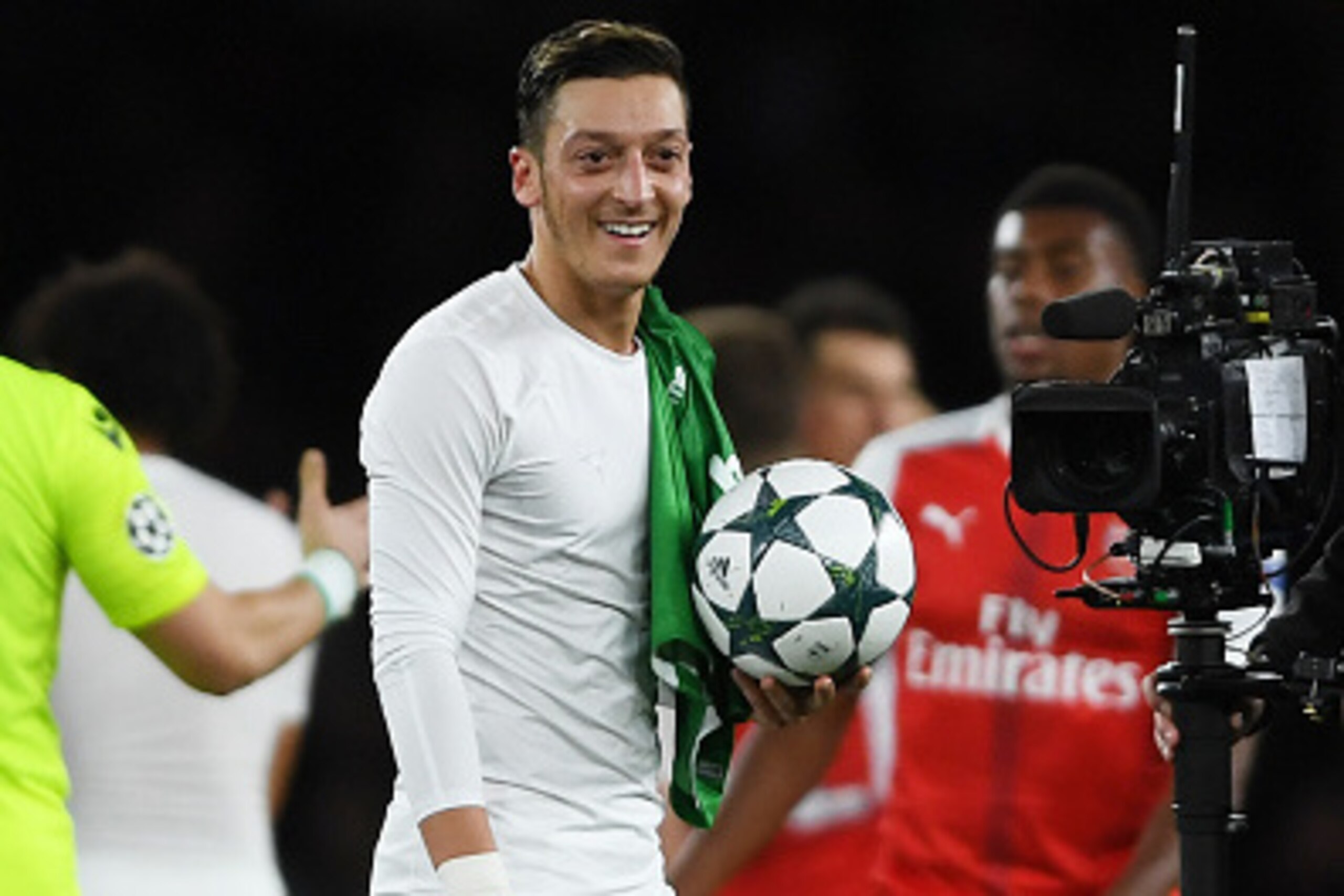 LONDON, ENGLAND - OCTOBER 19:  Mesut Ozil of Arsenal collects the match ball after scoring a hat trick during the UEFA Champions League group A match between Arsenal FC and PFC Ludogorets Razgrad at the Emirates Stadium on October 19, 2016 in London, Engl