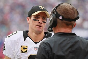 EAST RUTHERFORD, NJ - SEPTEMBER 18:  Quarterback  Drew Brees #9 of the New Orleans Saints talks with head coach Sean Payton as they take on the New York Giants during the second half at MetLife Stadium on September 18, 2016 in East Rutherford, New Jersey.