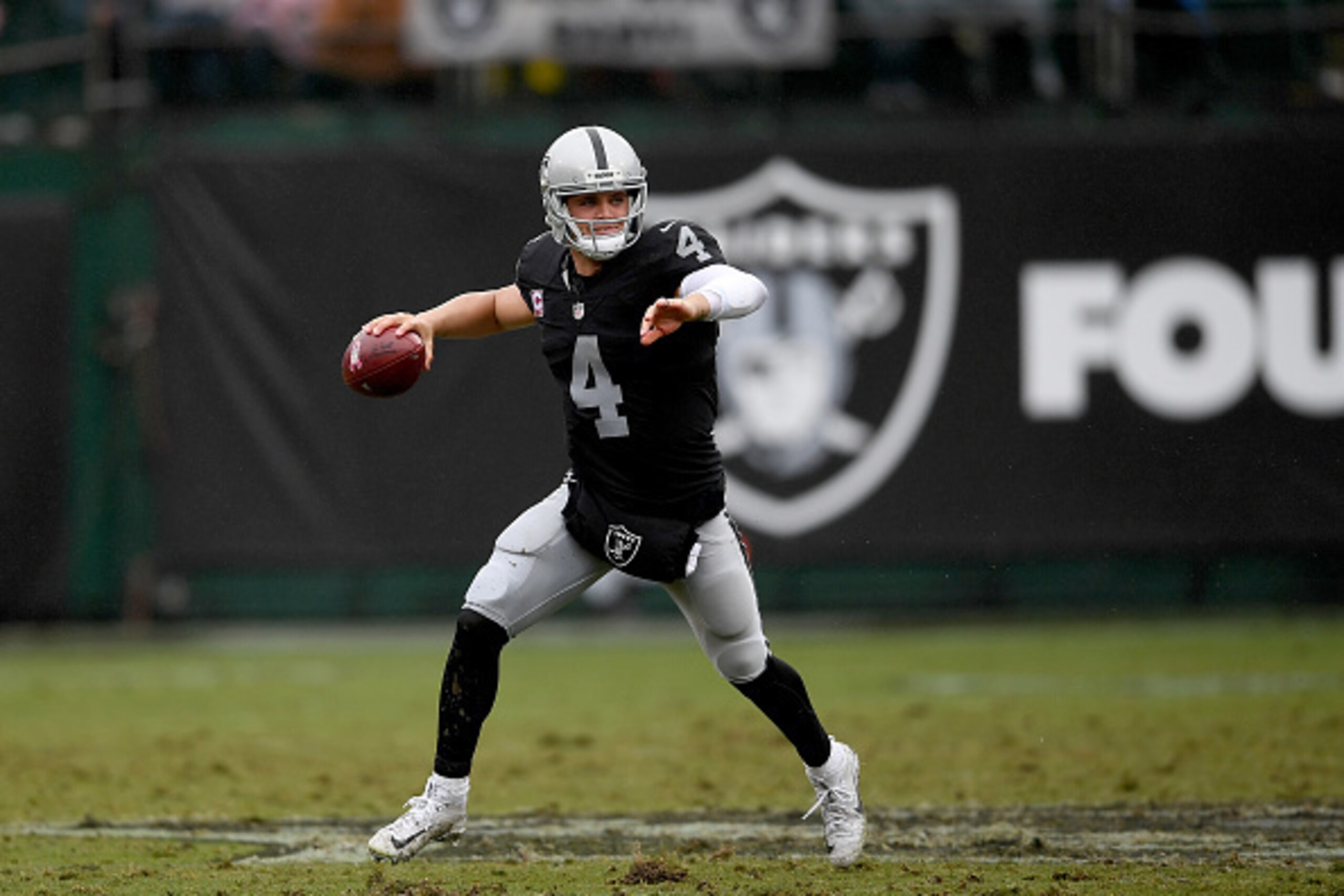OAKLAND, CA - OCTOBER 16: Derek Carr #4 of the Oakland Raiders looks to pass against the Kansas City Chiefs during an NFL football game at Oakland-Alameda County Coliseum on October 16, 2016 in Oakland, California. (Photo by Thearon W. Henderson/Getty I OAKLAND, CA - OCTOBER 16: Derek Carr #4 of the Oakland Raiders looks to pass against the Kansas City Chiefs during an NFL football game at Oakland-Alameda County Coliseum on October 16, 2016 in Oakland, California. (Photo by Thearon W. Henderson/Getty I
