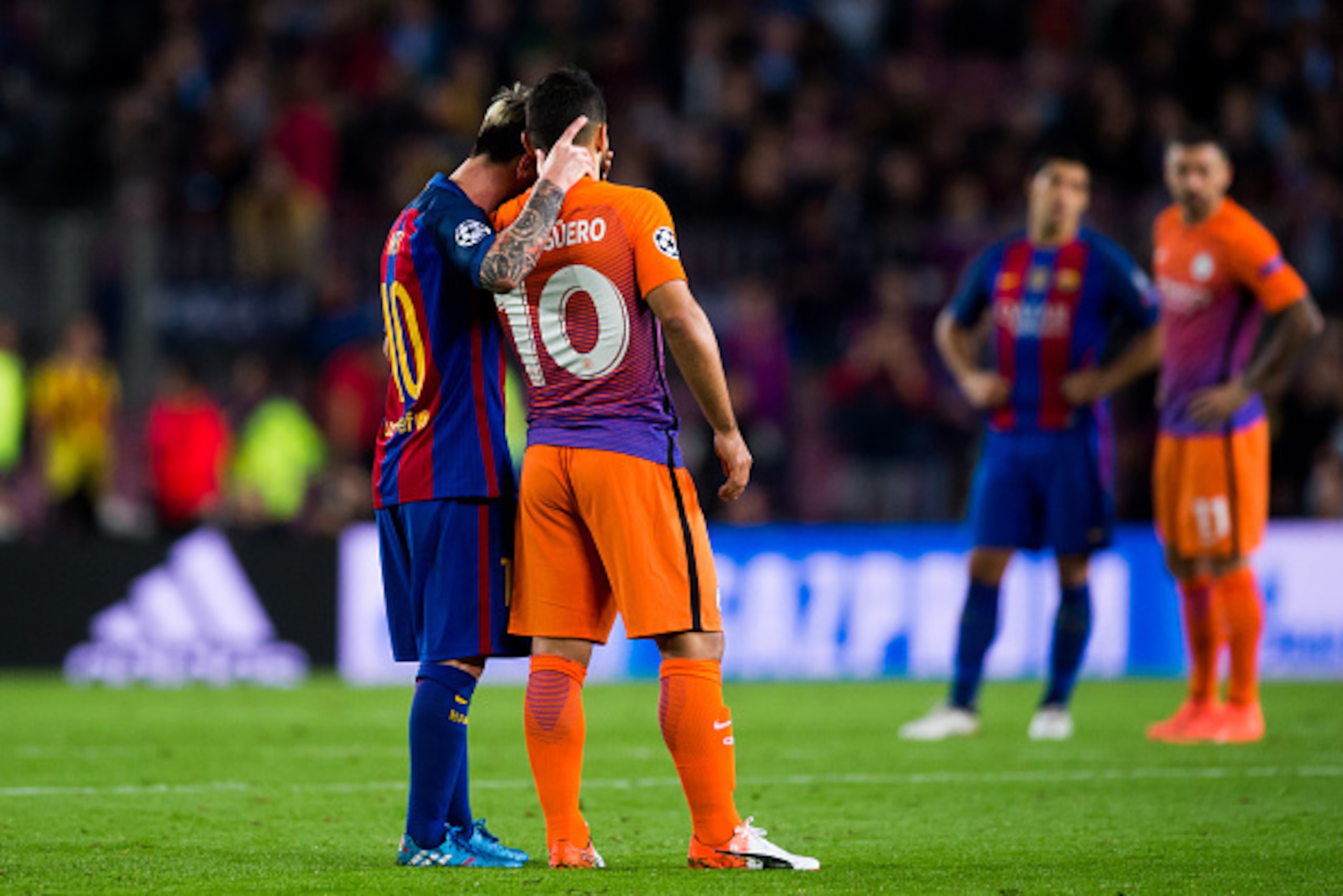 BARCELONA, SPAIN - OCTOBER 19: Lionel Messi (L) of FC Barcelona comforts Sergio Aguero (2nd L) of Manchester City FC during the UEFA Champions League group C match between FC Barcelona and Manchester City FC at Camp Nou on October 19, 2016 in Barcelona, S BARCELONA, SPAIN - OCTOBER 19: Lionel Messi (L) of FC Barcelona comforts Sergio Aguero (2nd L) of Manchester City FC during the UEFA Champions League group C match between FC Barcelona and Manchester City FC at Camp Nou on October 19, 2016 in Barcelona, S