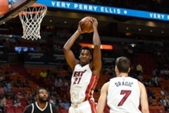 Oct 11, 2016; Miami, FL, USA; Miami Heat center Hassan Whiteside (21) reaches for a rebound during the first half against the Brooklyn Nets at American Airlines Arena. Mandatory Credit: Steve Mitchell-USA TODAY Sports