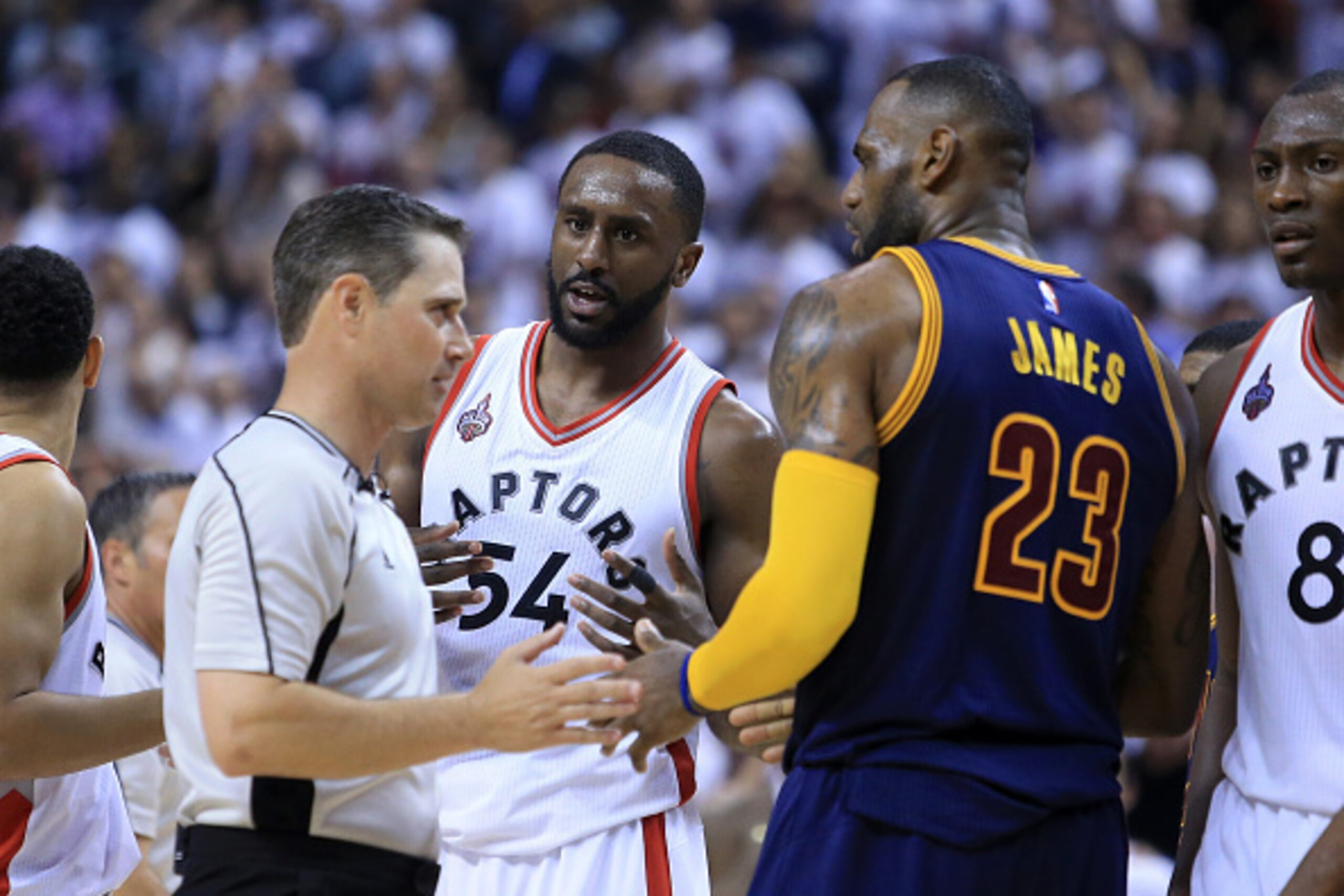 TORONTO, ON - MAY 23: Patrick Patterson #54 of the Toronto Raptors and LeBron James #23 of the Cleveland Cavaliers react with an official after a foul in the second half in game four of the Eastern Conference Finals during the 2016 NBA Playoffs at the Air TORONTO, ON - MAY 23: Patrick Patterson #54 of the Toronto Raptors and LeBron James #23 of the Cleveland Cavaliers react with an official after a foul in the second half in game four of the Eastern Conference Finals during the 2016 NBA Playoffs at the Air