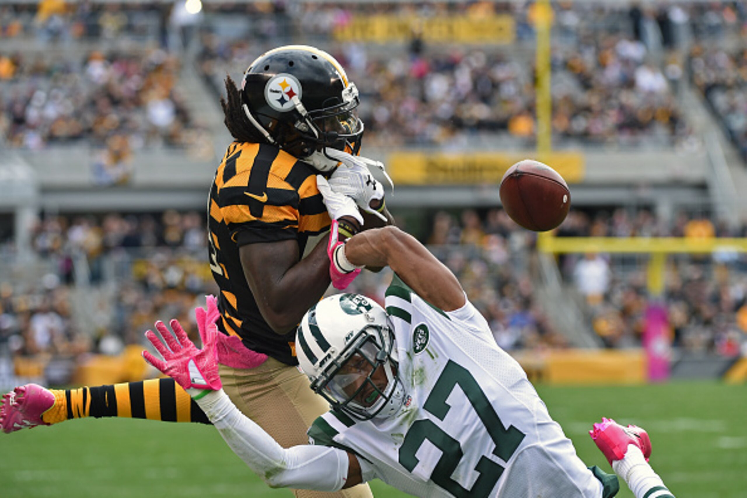 PITTSBURGH, PA - OCTOBER 09: Cornerback Darryl Roberts #27 of the New York Jets breaks up a pass intended for wide receiver Sammie Coates #14 of the Pittsburgh Steelers during a game at Heinz Field on October 9, 2016 in Pittsburgh, Pennsylvania. The Steel