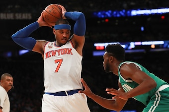 NEW YORK, NY - OCTOBER 15:  Carmelo Anthony #7 of the New York Knicks defended by Jaylen Brown #7 of the Boston Celtics during the first half of their preseason game at Madison Square Garden on October 15, 2016 in New York City. NOTE TO USER: User express