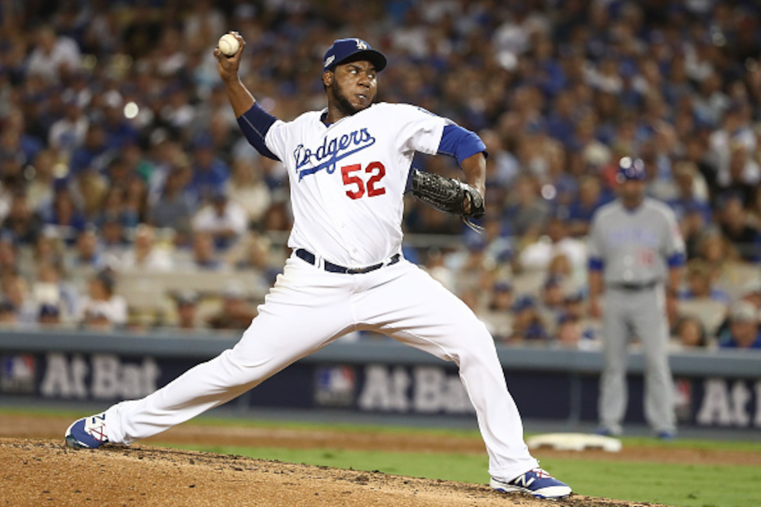LOS ANGELES, CA - OCTOBER 19:  Pedro Baez #52 of the Los Angeles Dodgers delivers a pitch in the fourth inning against the Chicago Cubs in game four of the National League Championship Series at Dodger Stadium on October 19, 2016 in Los Angeles, Californi