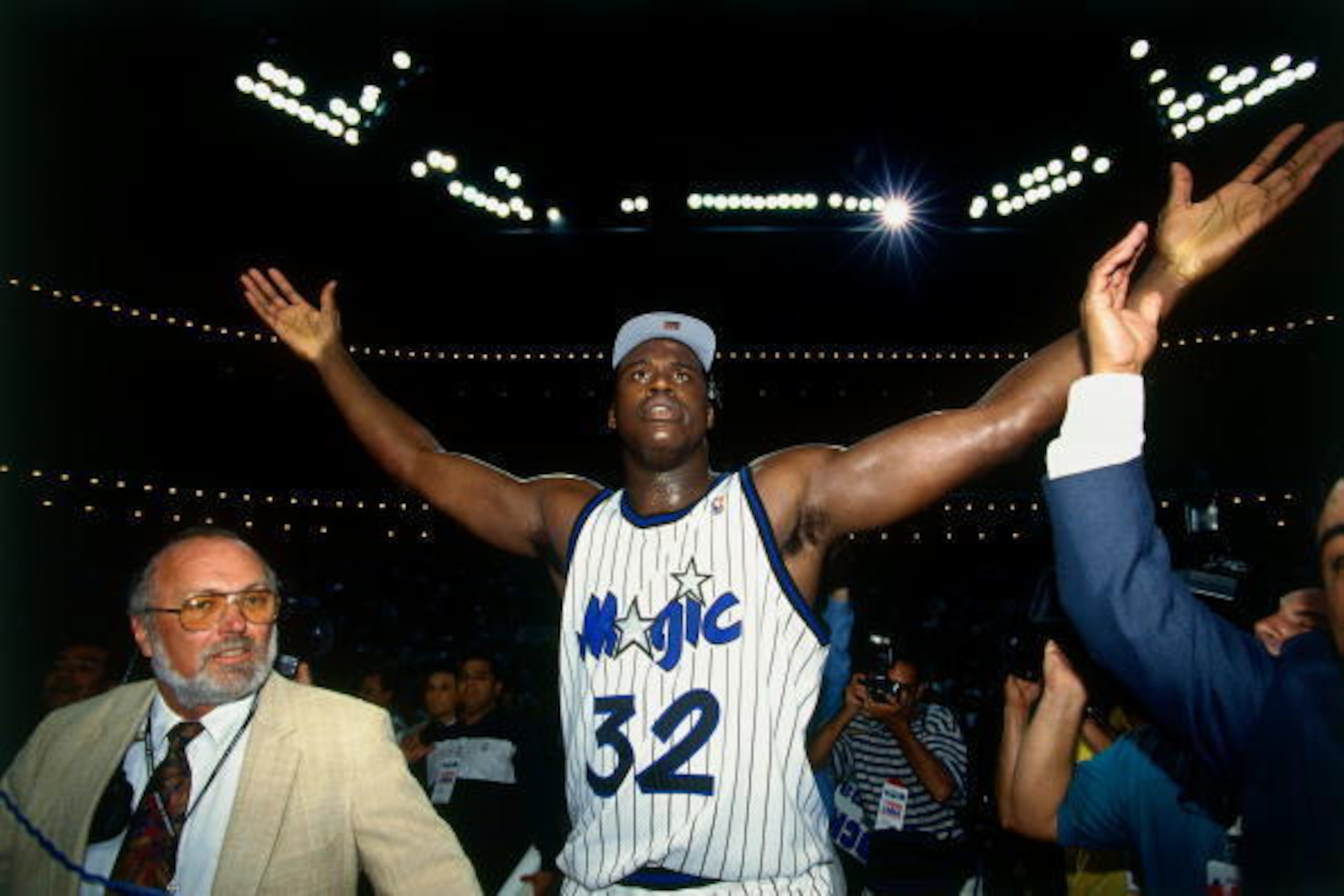 ORLANDO - JUNE 4:  Shaquille O'Neal #32 of the Orlando Magic celebrates after defeating the Indian Pacers following Game Seven of the Eastern Conference Finals during the 1995 NBA Playoffs at the Orlando Arena on June 4, 1995 in Orlando, Florida. The Orla