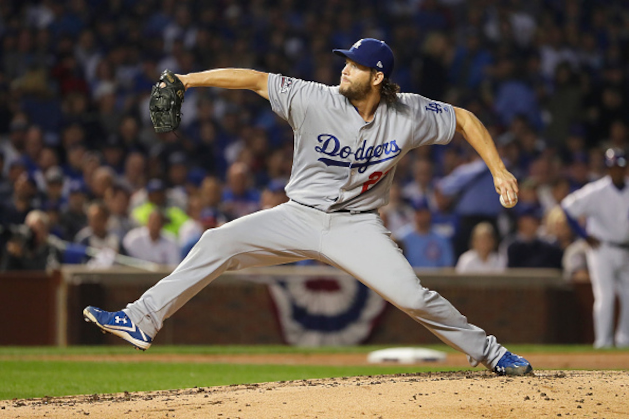 CHICAGO, IL - OCTOBER 16: Clayton Kershaw #22 of the Los Angeles Dodgers throws a pitch in the fifth inning against the Chicago Cubs during game two of the National League Championship Series at Wrigley Field on October 16, 2016 in Chicago, Illinois. (P CHICAGO, IL - OCTOBER 16: Clayton Kershaw #22 of the Los Angeles Dodgers throws a pitch in the fifth inning against the Chicago Cubs during game two of the National League Championship Series at Wrigley Field on October 16, 2016 in Chicago, Illinois. (P