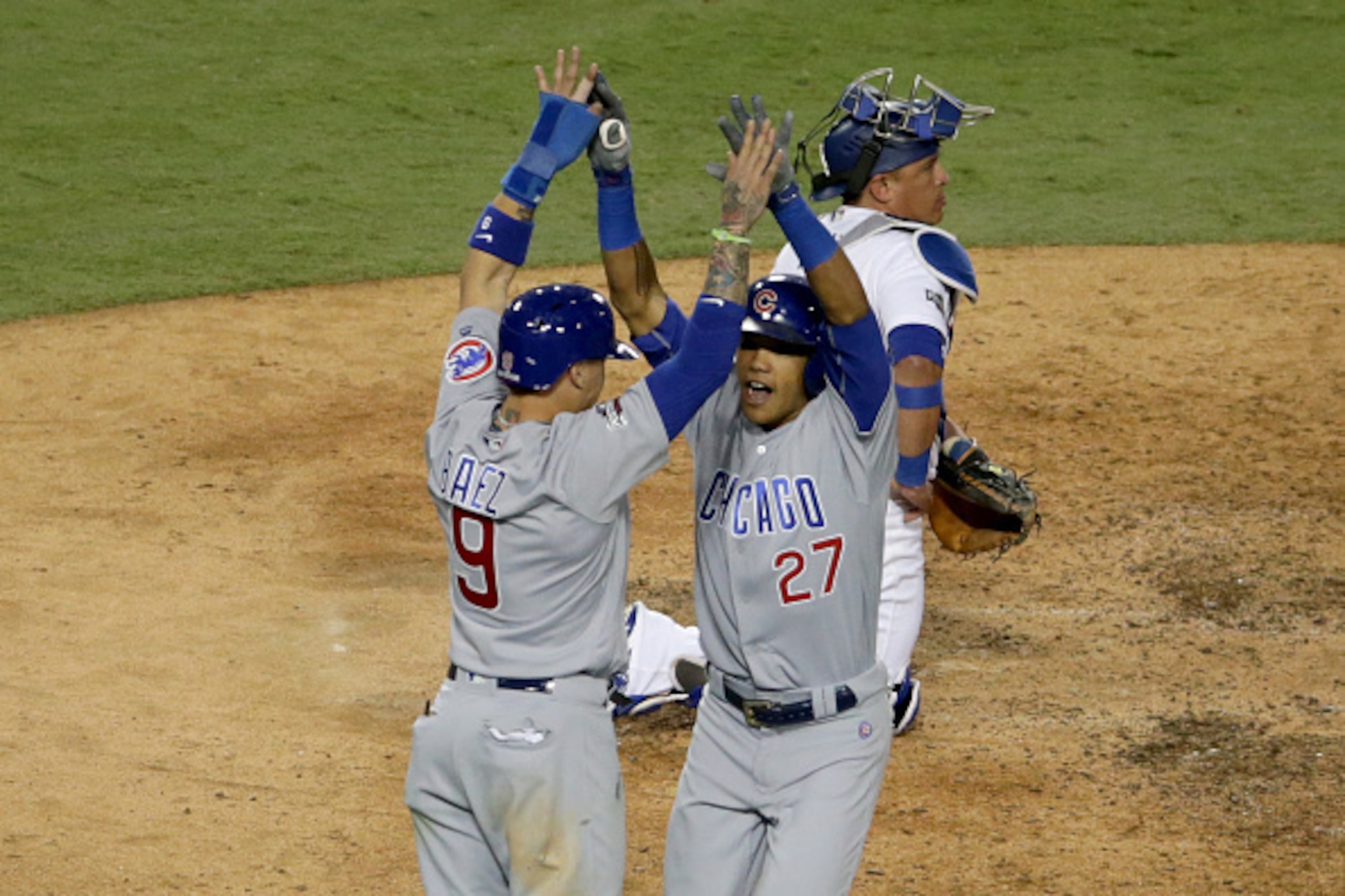 LOS ANGELES, CA - OCTOBER 20: Javier Baez #9 and Addison Russell #27 of the Chicago Cubs celebrate after a two-run home run in the sixth inning against the Los Angeles Dodgers in game five of the National League Division Series at Dodger Stadium on Octobe LOS ANGELES, CA - OCTOBER 20: Javier Baez #9 and Addison Russell #27 of the Chicago Cubs celebrate after a two-run home run in the sixth inning against the Los Angeles Dodgers in game five of the National League Division Series at Dodger Stadium on Octobe