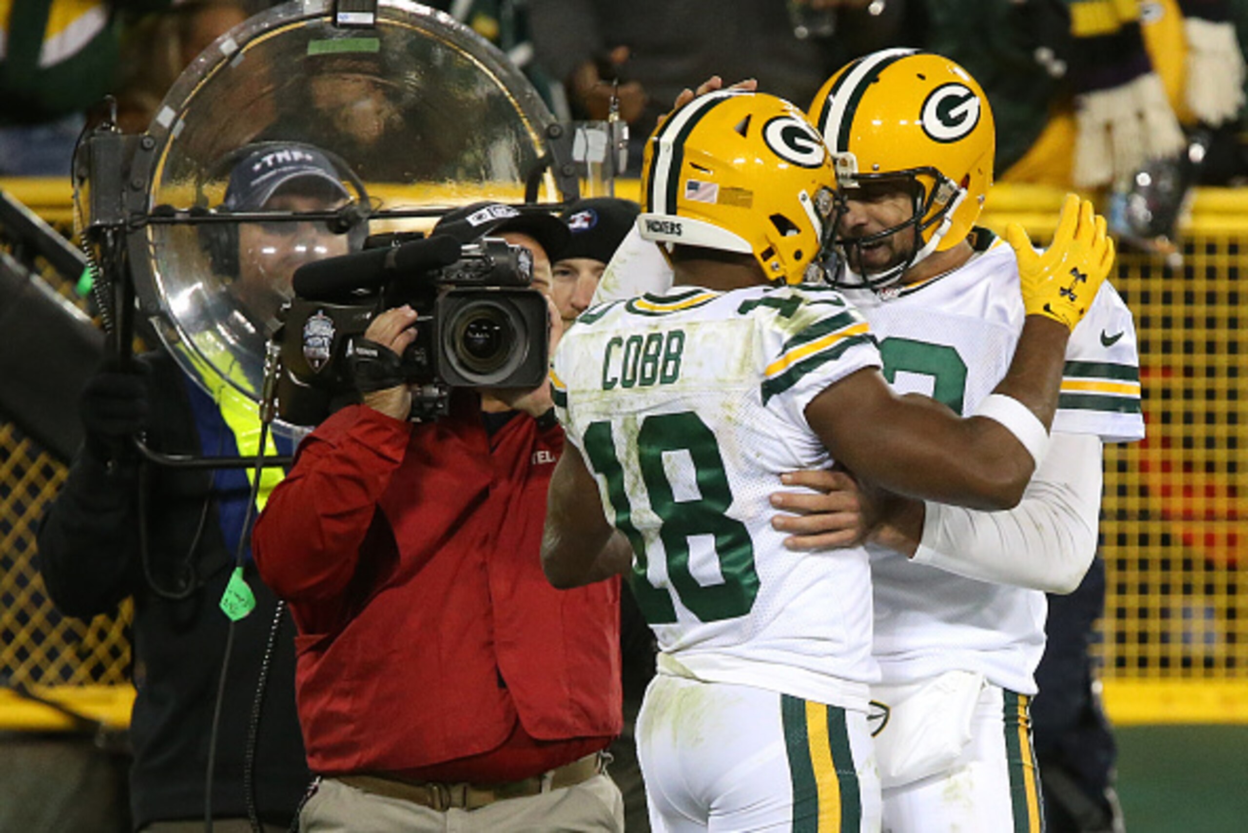 GREENBAY, WI - OCTOBER 20: Wide receiver Randall Cobb #18 of the Green Bay Packers celebrates with teammate quarterback Aaron Rodgers #12 after scoring a fourth quarter touchdown against the Chicago Bears at Lambeau Field on October 20, 2016 in Green Bay,