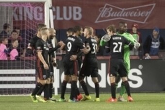 Oct 1, 2016; Toronto, Ontario, CAN; D.C. United midfielder Collin Martin (27) celebrates the win with D.C. United goalkeeper Bill Hamid (28) at the end of a game against Toronto FC at BMO Field. D.C. United won 2-1. Mandatory Credit: Nick Turchiaro-USA TO