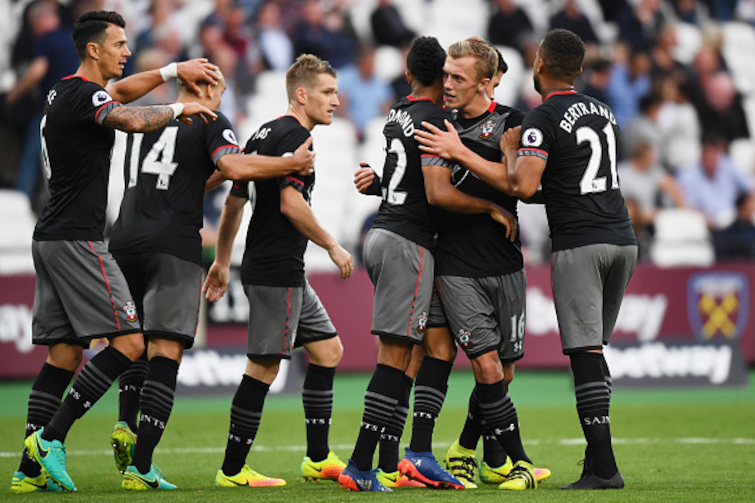 LONDON, ENGLAND - SEPTEMBER 25:  James Ward-Prowse of Southampton (16) celebrates with team mates as he scores their third goal during the Premier League match between West Ham United and Southampton at London Stadium on September 25, 2016 in London, Engl