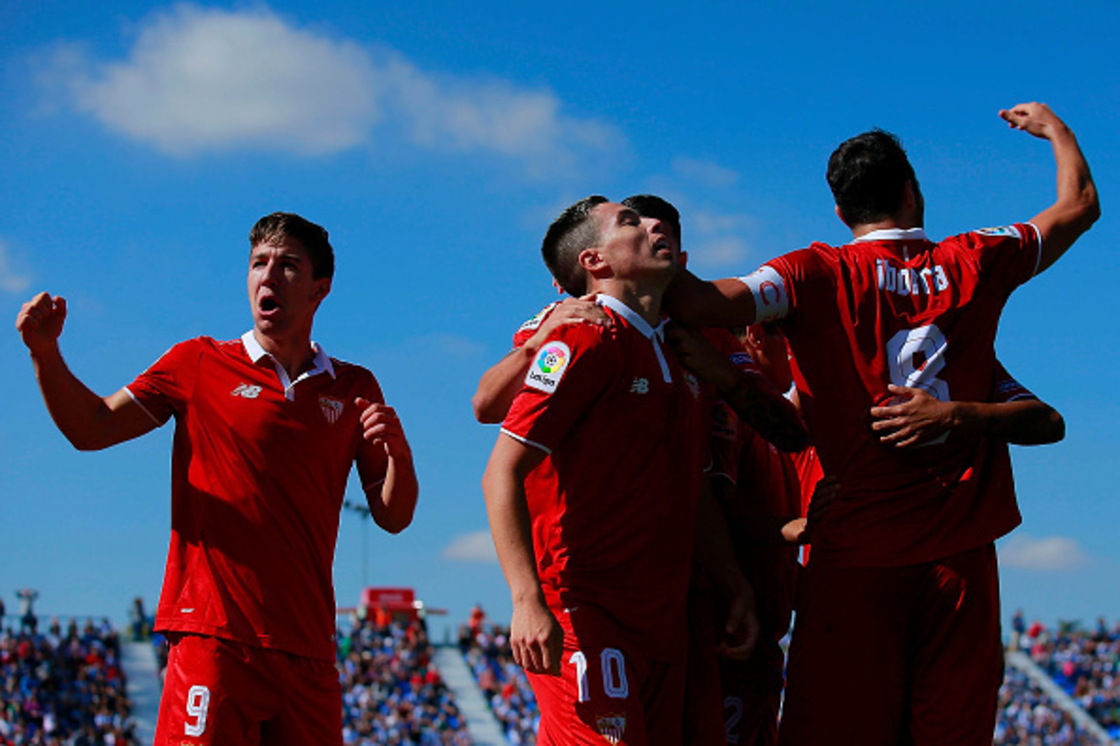 MADRID, SPAIN - OCTOBER 15: Samir Nasri (2ndL) of Sevilla FC celebrates scoring their second goal with teammates Luciano Vietto (L) and Vicente Iborra (R) during the La Liga match between CD Leganes and Sevilla FC at Estadio Municipal de Butarque on Octob MADRID, SPAIN - OCTOBER 15: Samir Nasri (2ndL) of Sevilla FC celebrates scoring their second goal with teammates Luciano Vietto (L) and Vicente Iborra (R) during the La Liga match between CD Leganes and Sevilla FC at Estadio Municipal de Butarque on Octob