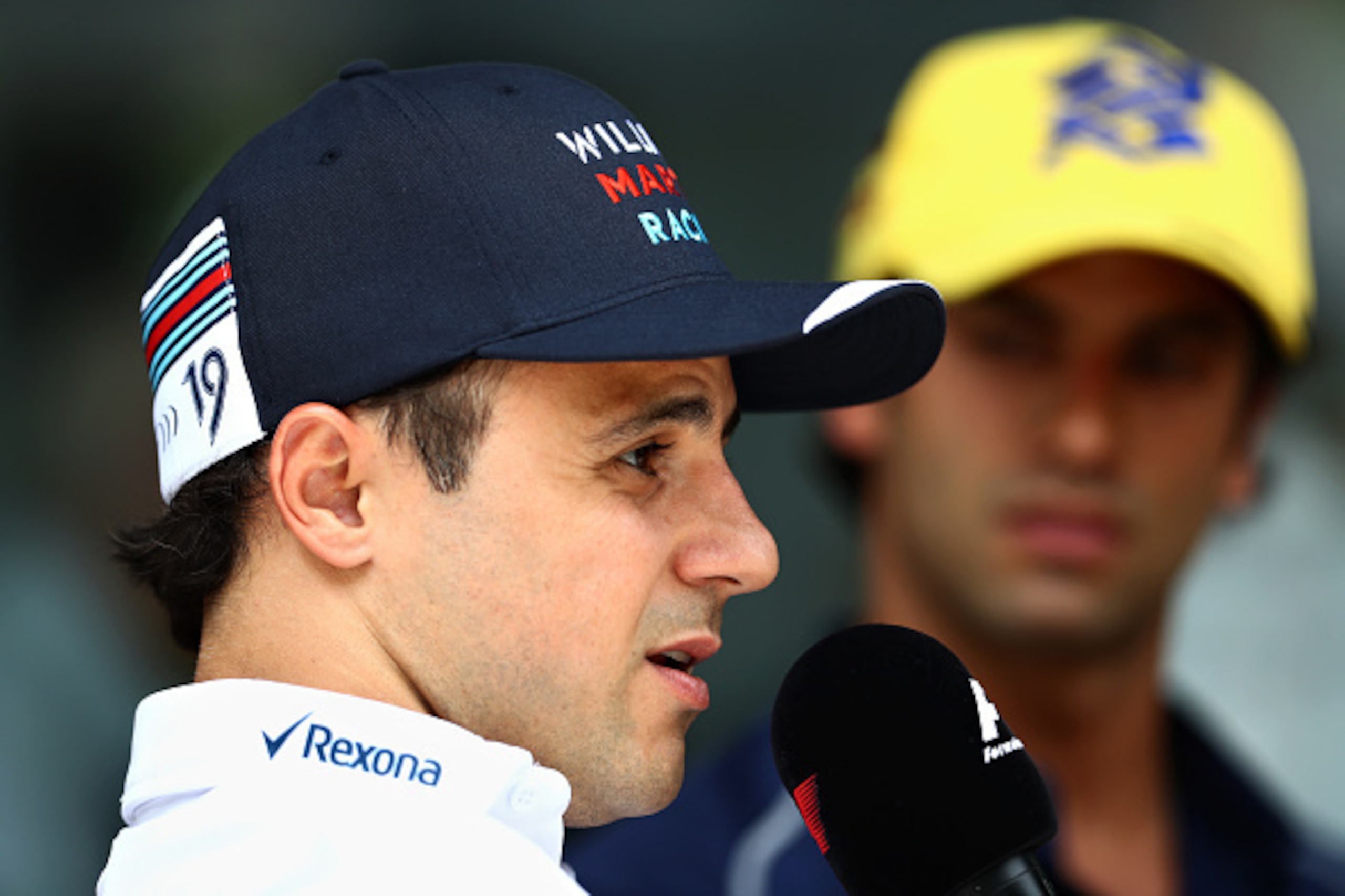 KUALA LUMPUR, MALAYSIA - SEPTEMBER 29: Felipe Massa of Brazil and Williams and Felipe Nasr of Brazil and Sauber F1 talk to the media in the Paddock during previews for the Malaysia Formula One Grand Prix at Sepang Circuit on September 29, 2016 in Kuala Lu