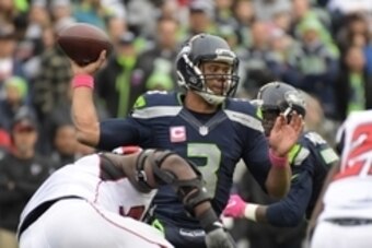 Oct 16, 2016; Seattle, WA, USA; Seattle Seahawks quarterback Russell Wilson (3) throws a pass against the Atlanta Falcons during a NFL football game at CenturyLink Field. The Seahawks defeated the Falcons 26-24. Mandatory Credit: Kirby Lee-USA TODAY Sport